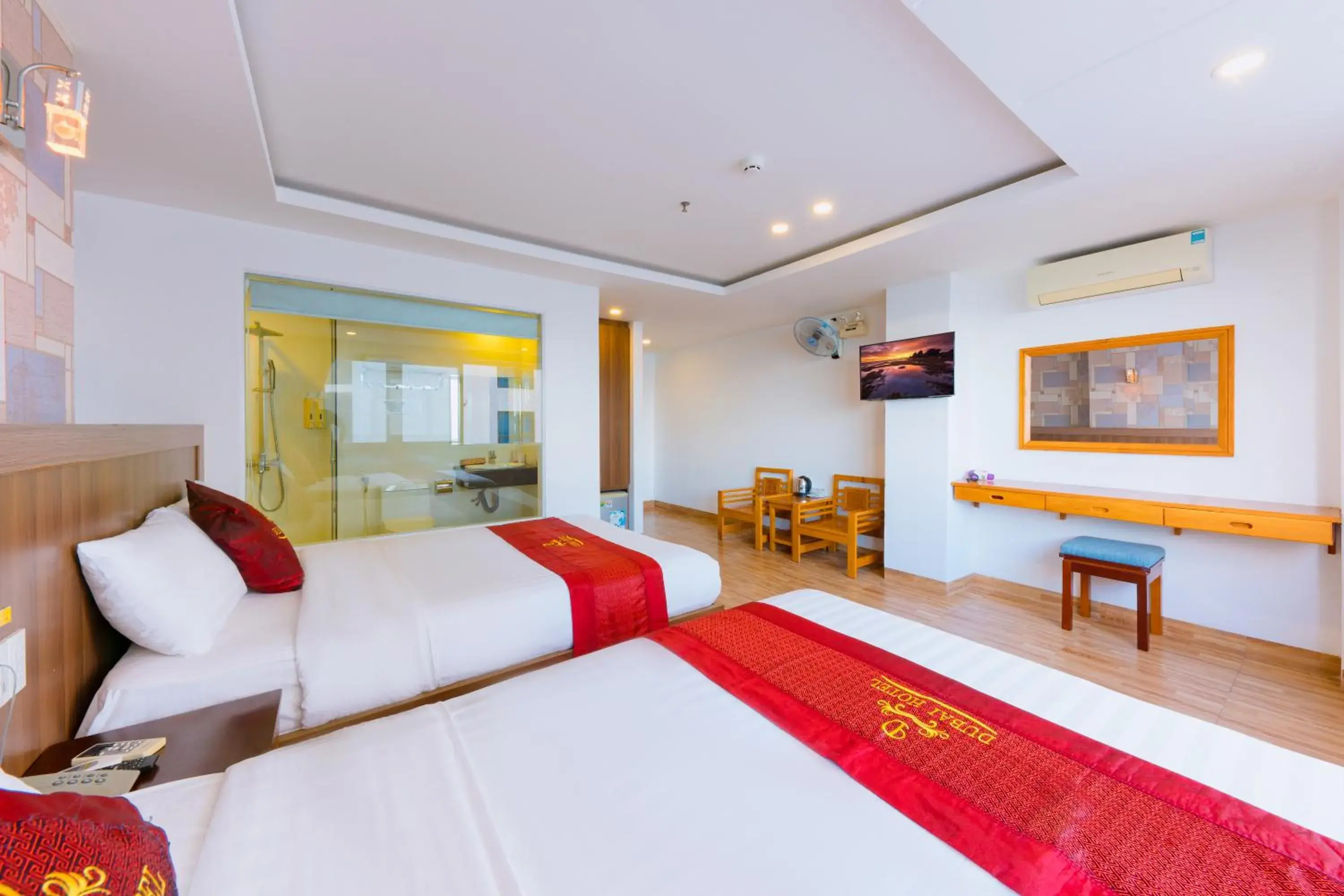 Communal lounge/ TV room, Bed in Dubai Nha Trang Hotel managed by HT Communal lounge/ TV room, Bed in Dubai Nha Trang Hotel managed by HT