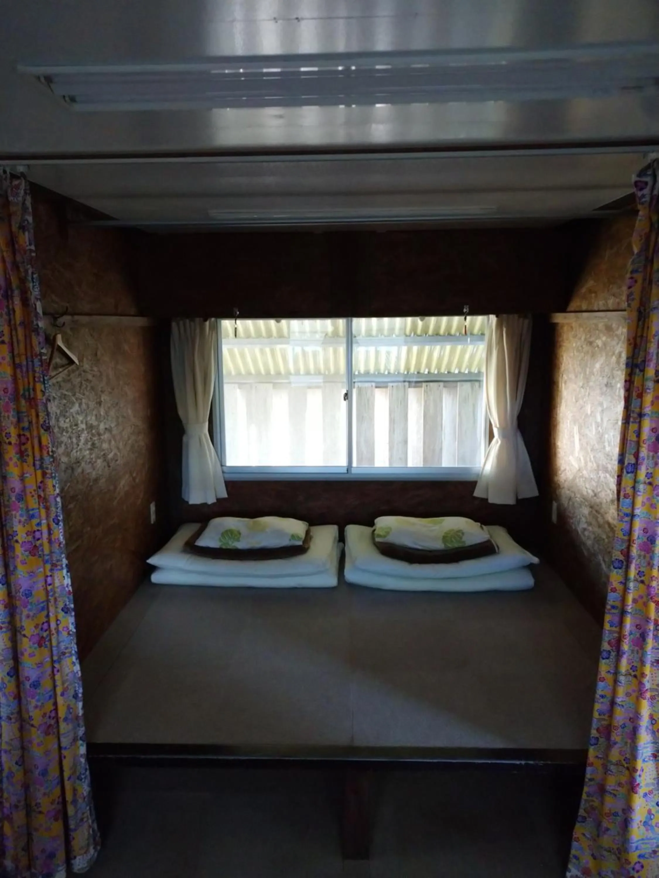 Bed in Sesoko Island Guest House Kafuu Village