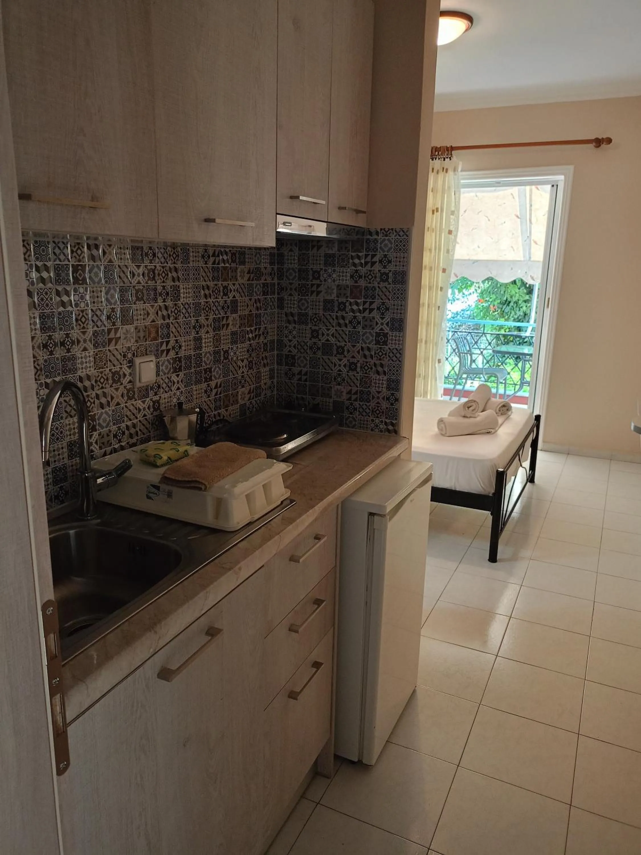Kitchen or kitchenette in Apartments Filoxenia Zois