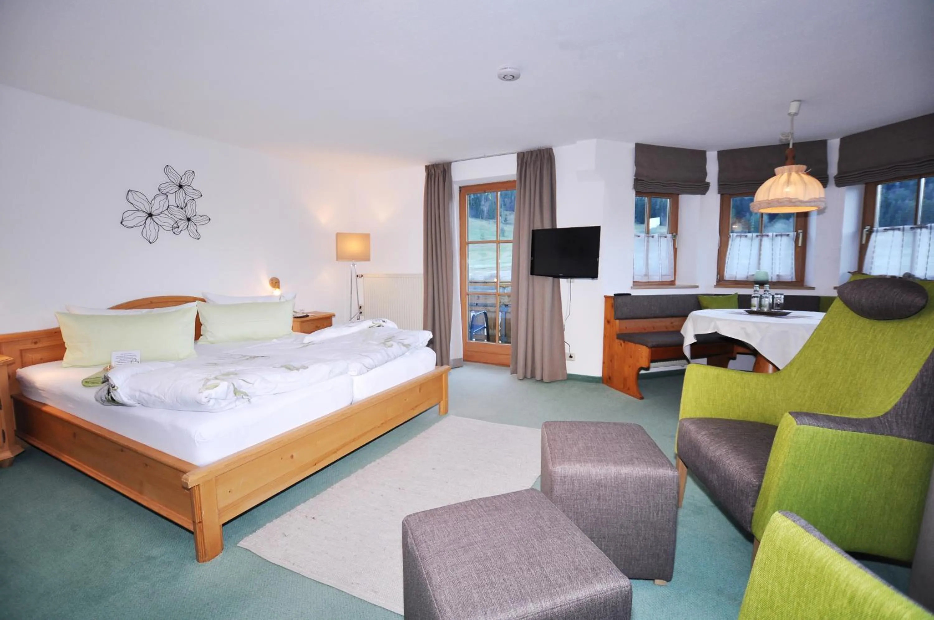 Photo of the whole room, Bed in Berghüs Schratt - EINFACH ANDERS - Ihr vegetarisches und veganes Biohotel