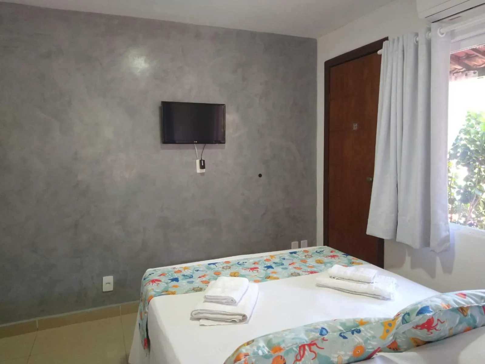 Photo of the whole room, Bed in Pousada Mar Mai