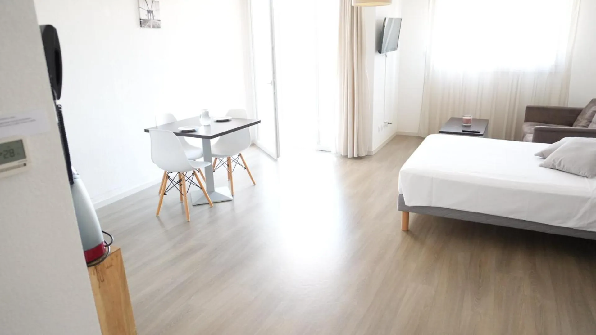 Bed in Zenao Appart'Hotel