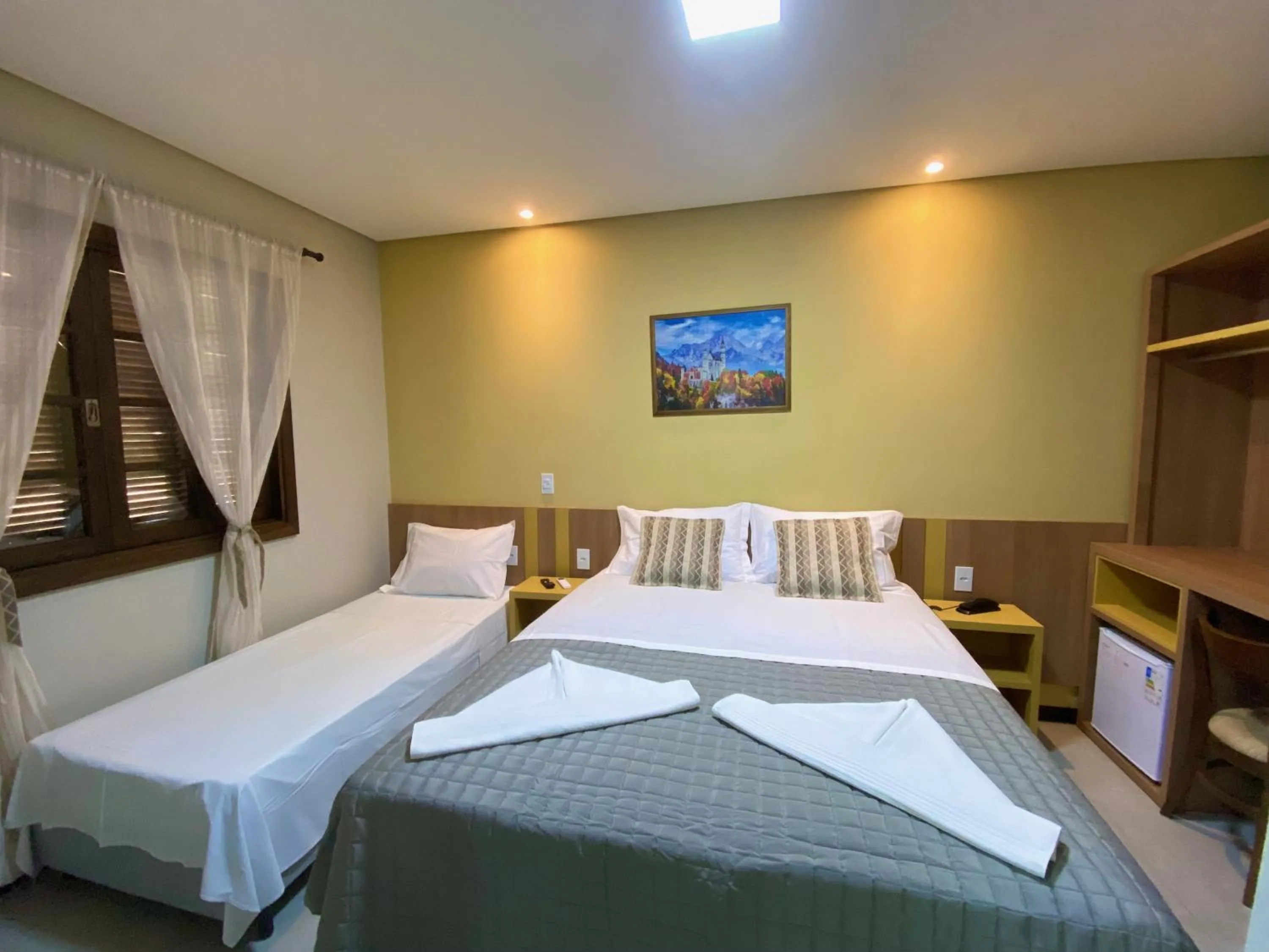 Photo of the whole room, Bed in Pousada Canasvieiras