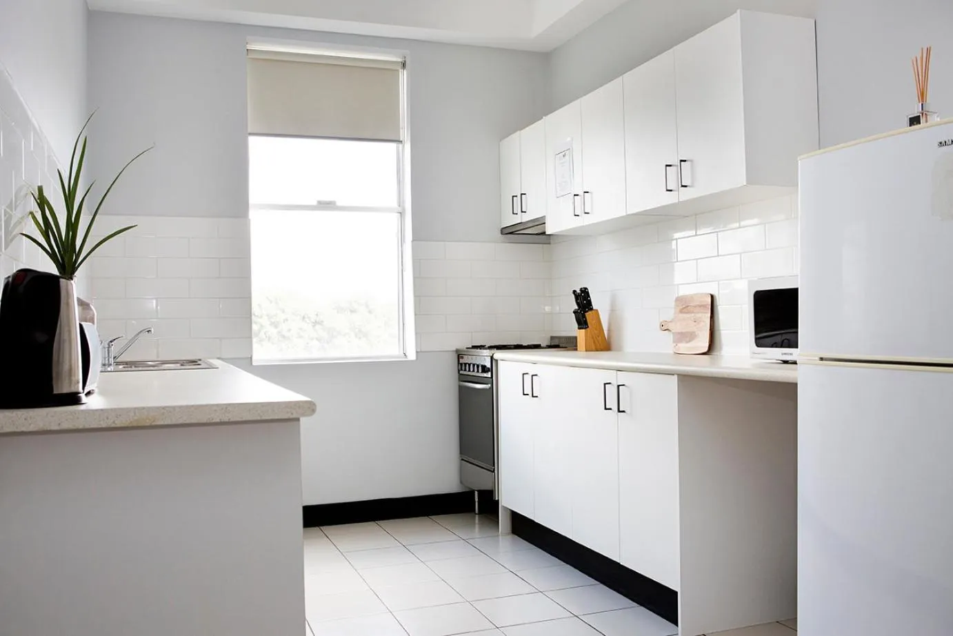 Kitchen or kitchenette in Revive Central Apartments