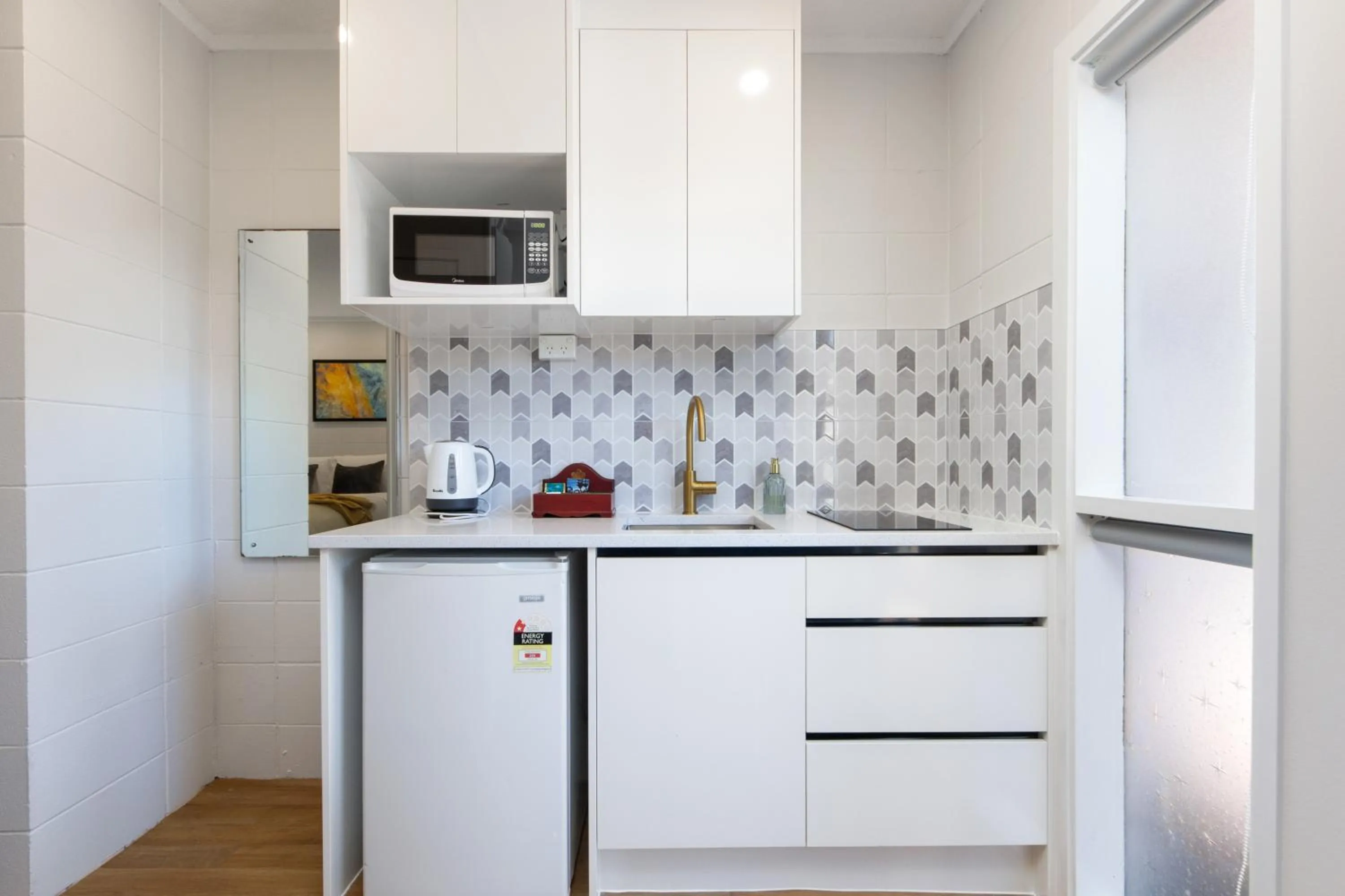 Kitchen or kitchenette in Epsom Motel