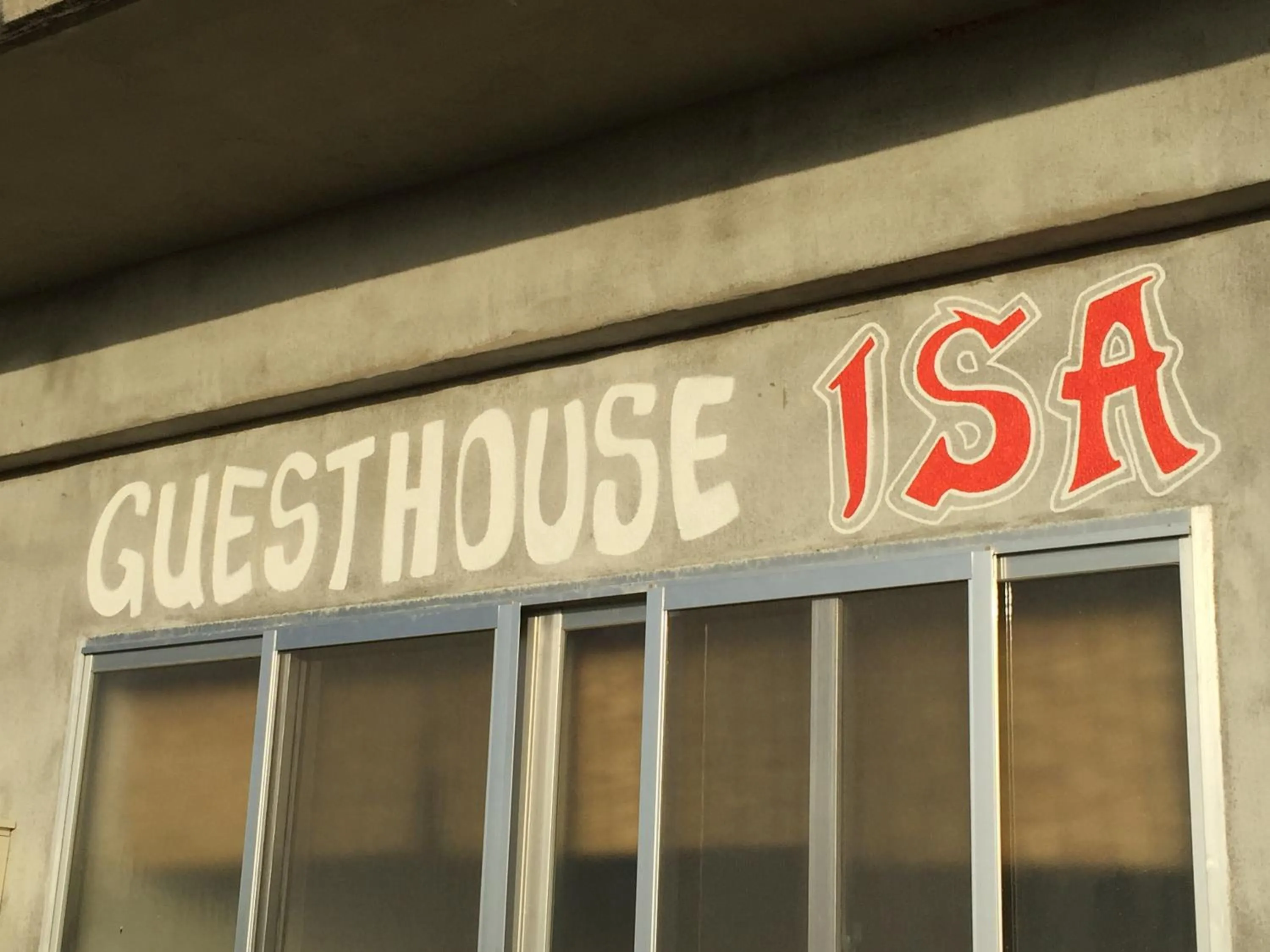 Property logo or sign in Guest House Isa