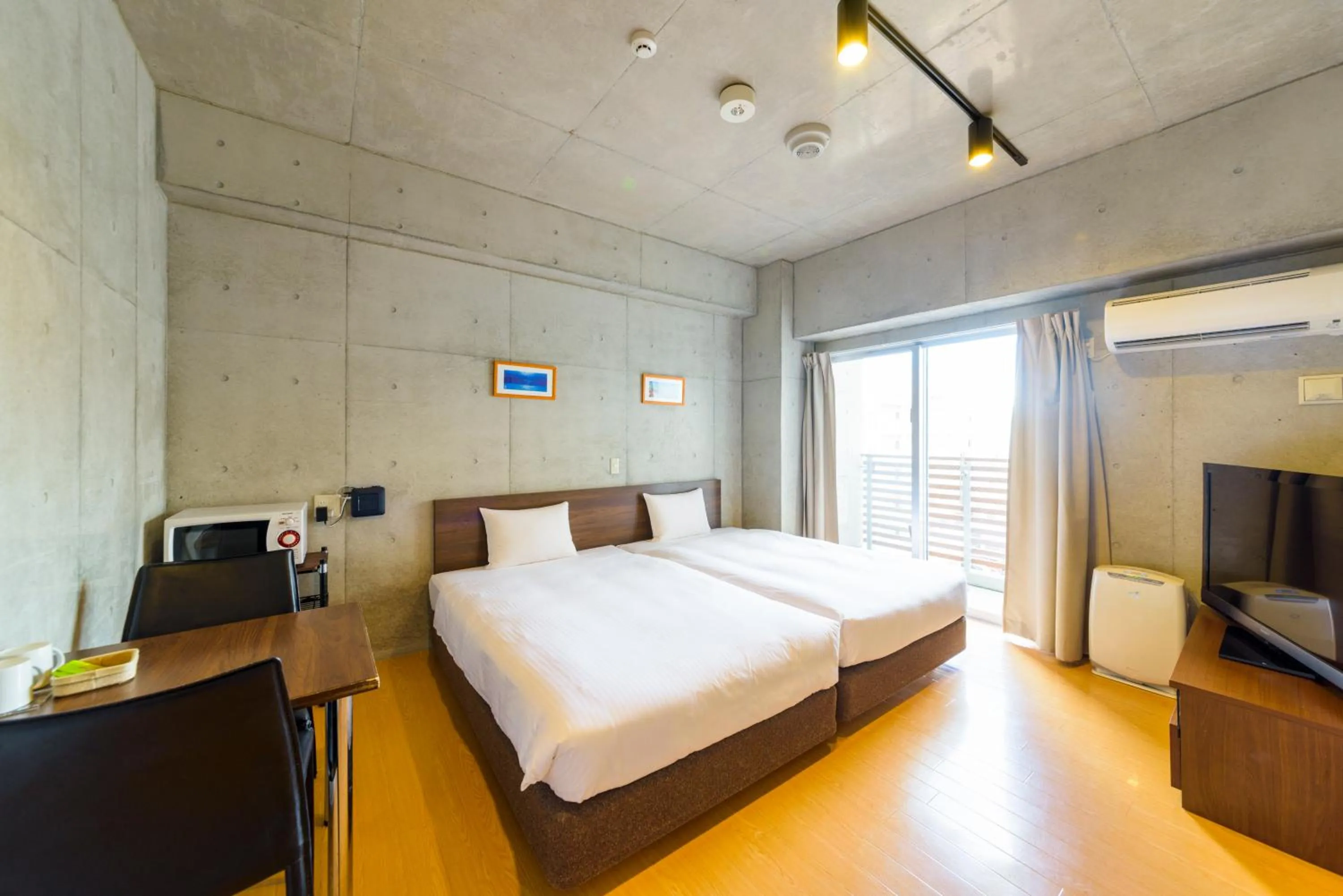 Photo of the whole room, Bed in NAHA-WEST INN