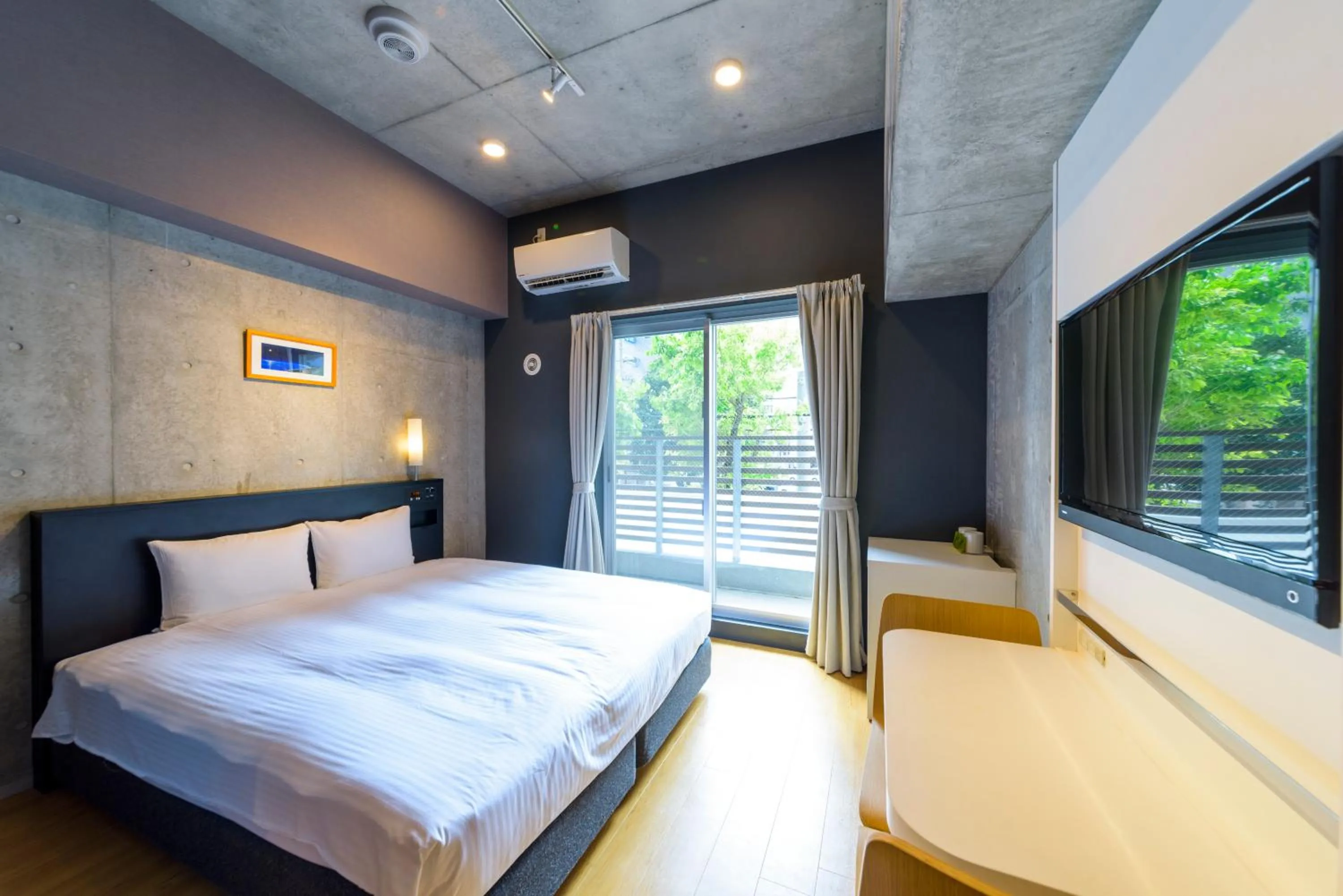 Photo of the whole room, Bed in NAHA-WEST INN