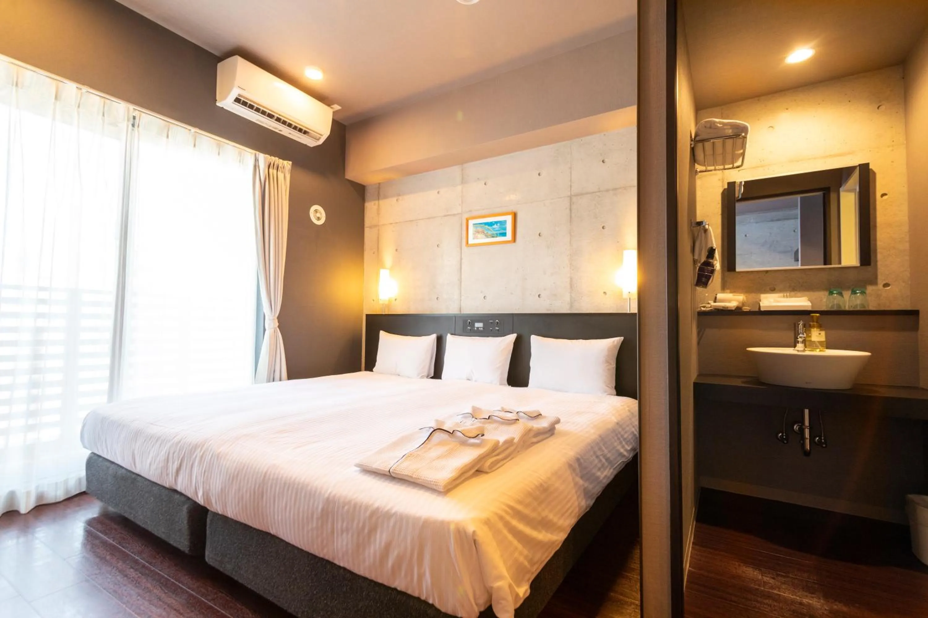 Photo of the whole room, Bed in NAHA-WEST INN