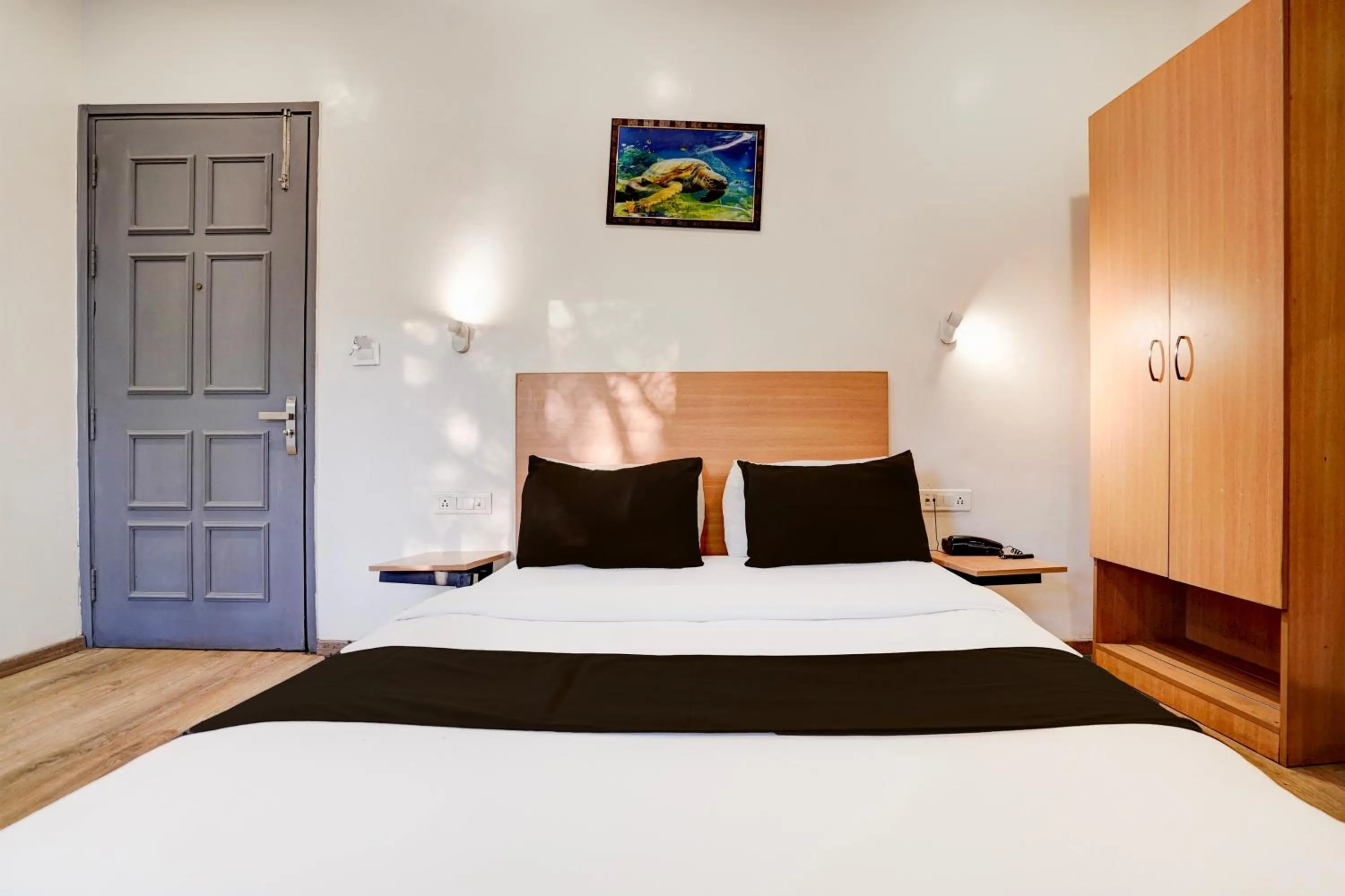 Bedroom in Super Hotel O Britania Chowk