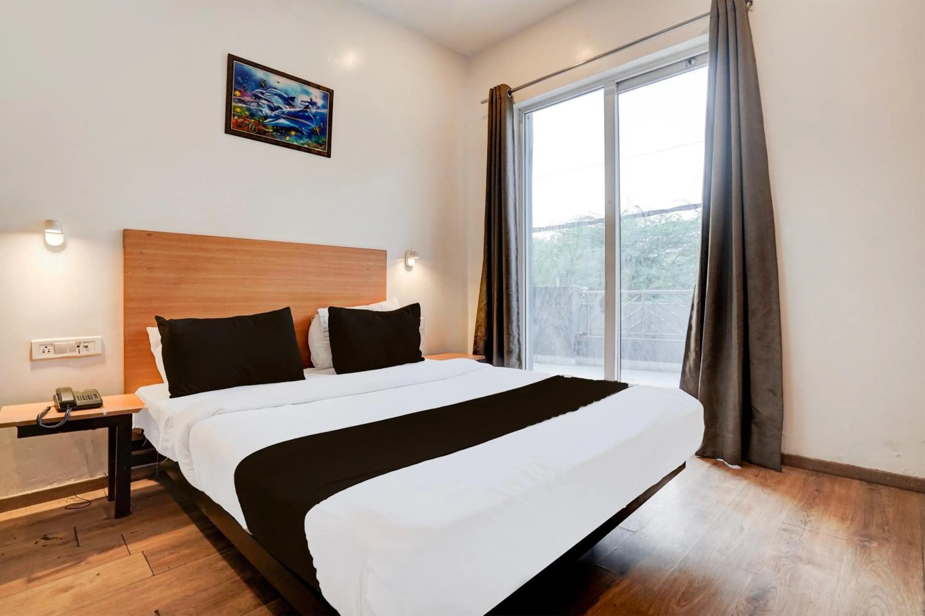 Bedroom in Super Hotel O Britania Chowk