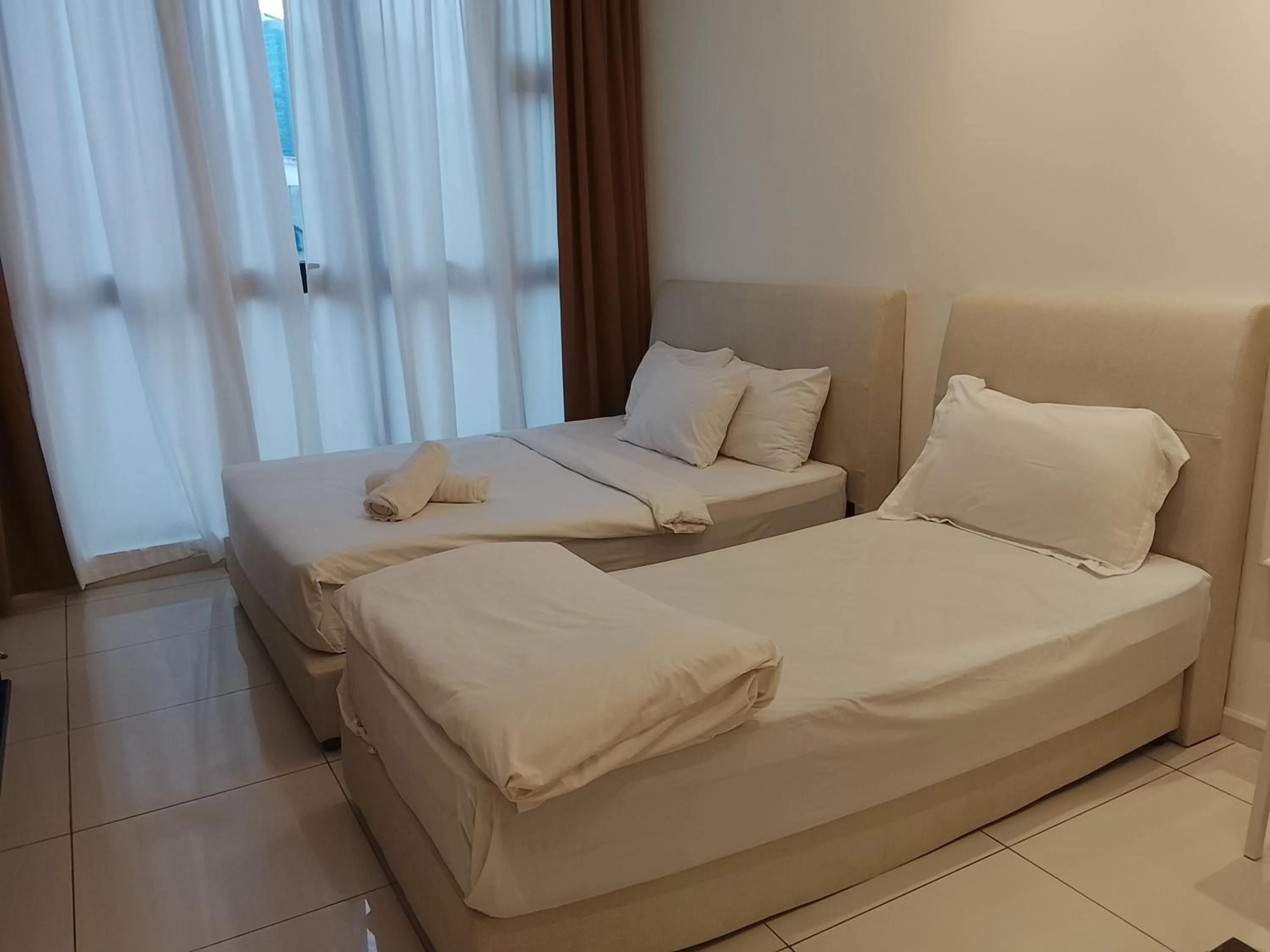 Bed in Quill Luxury Suites KLCC