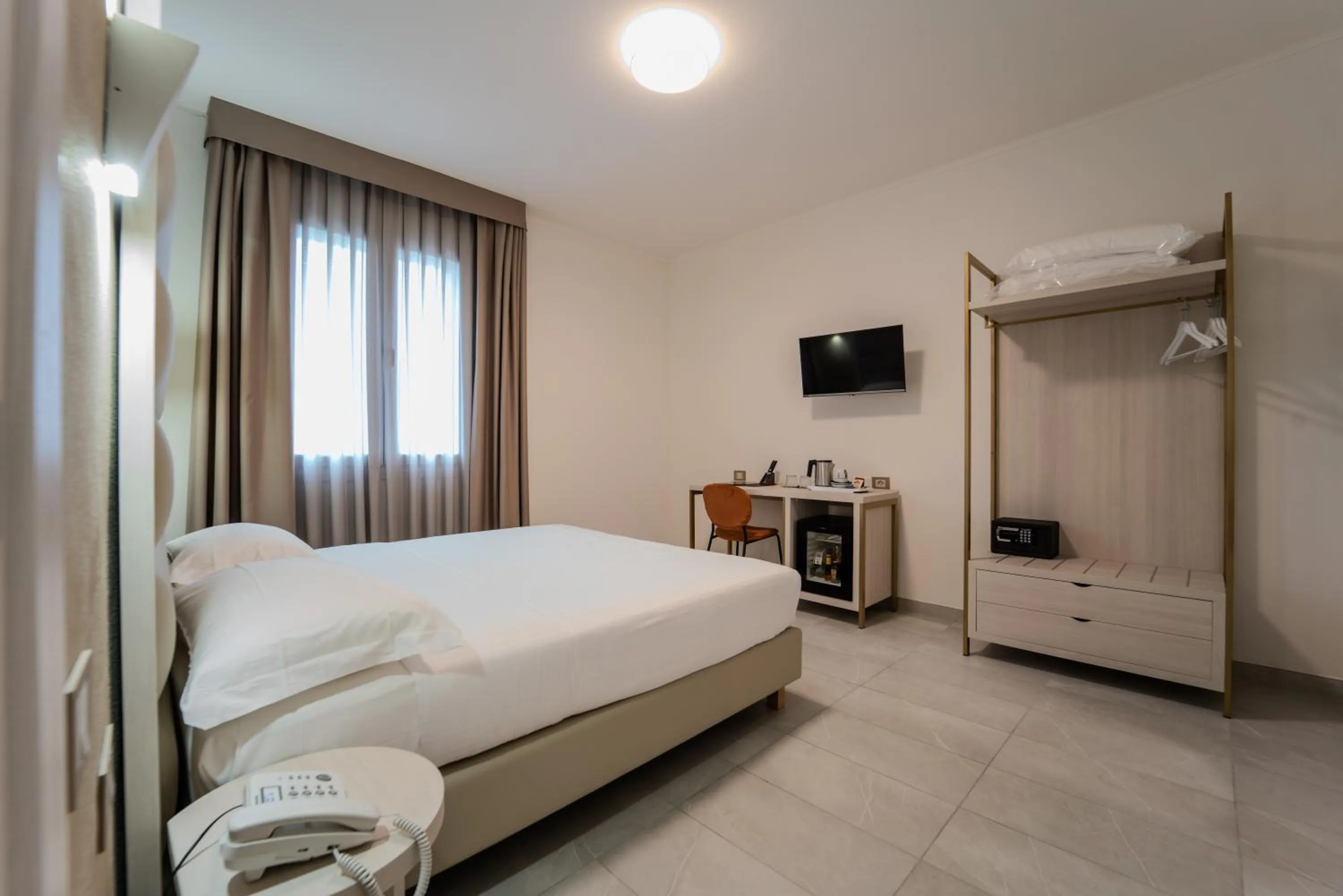 Bed in Hotel Donatello