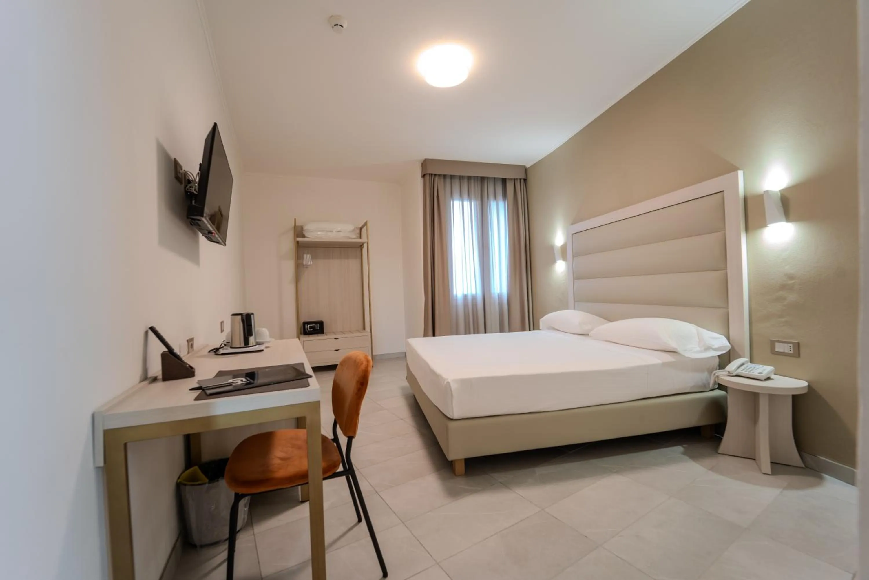 Bed in Hotel Donatello