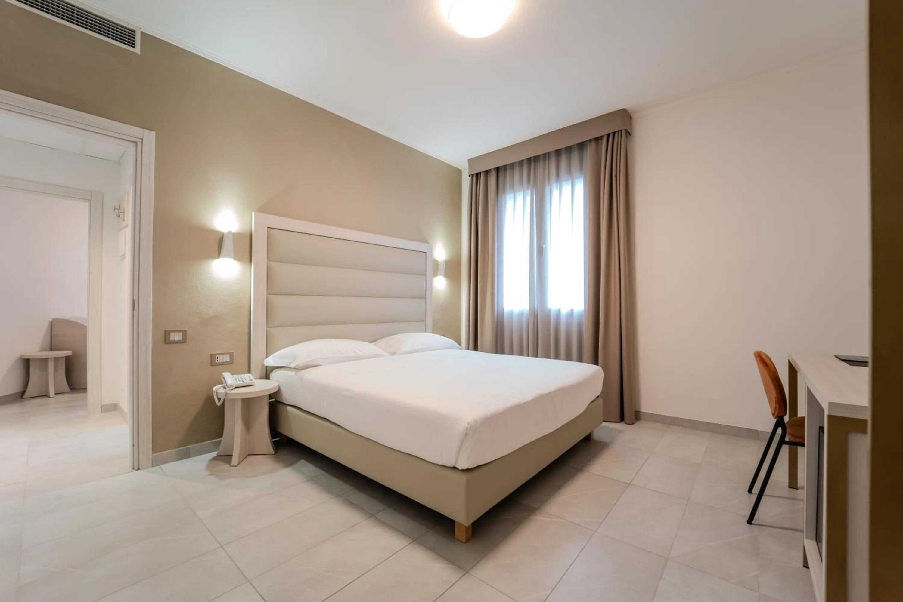 Bed in Hotel Donatello