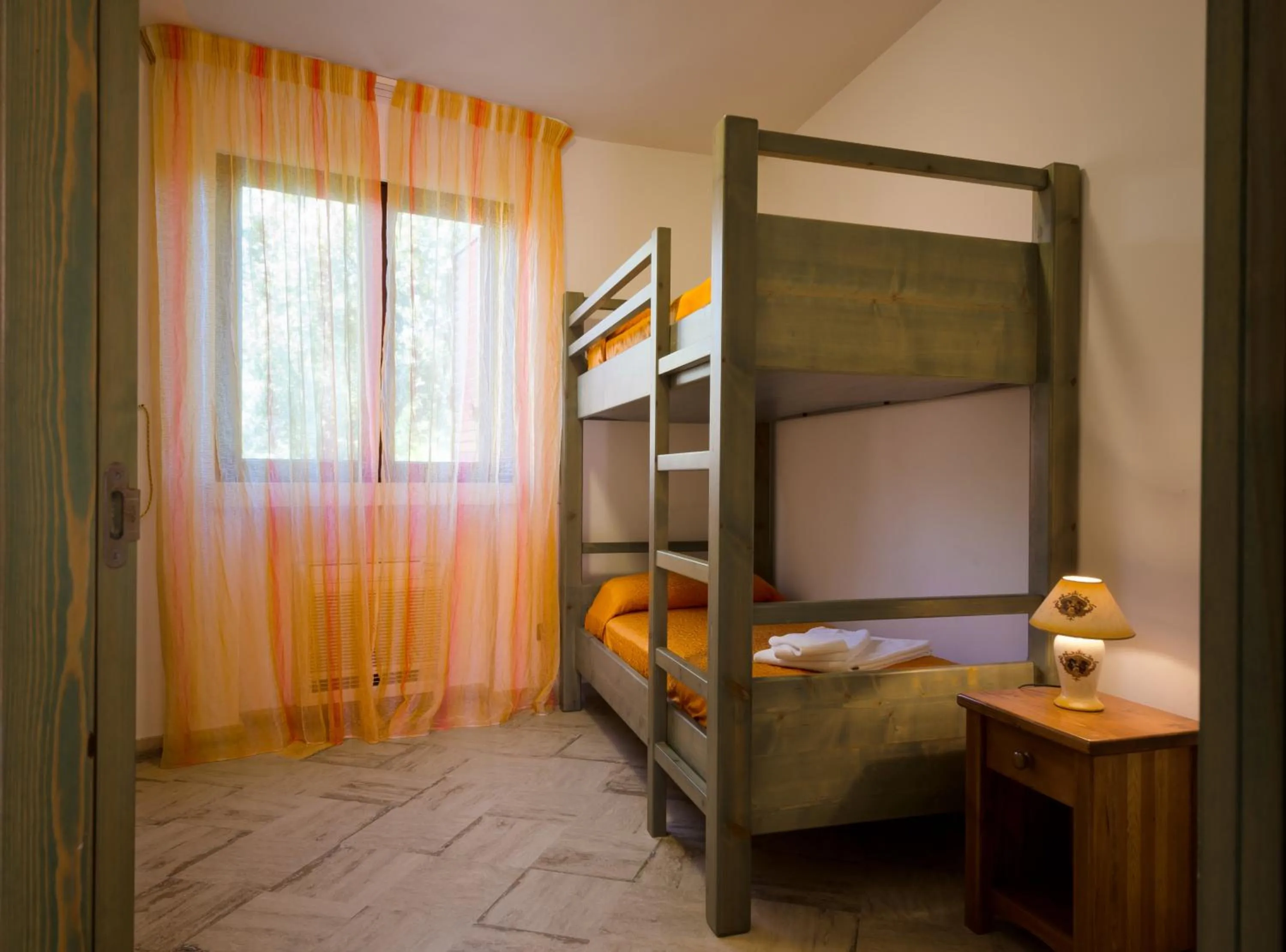 Bedroom in AmareGold Tenuta La Baronessa Resort