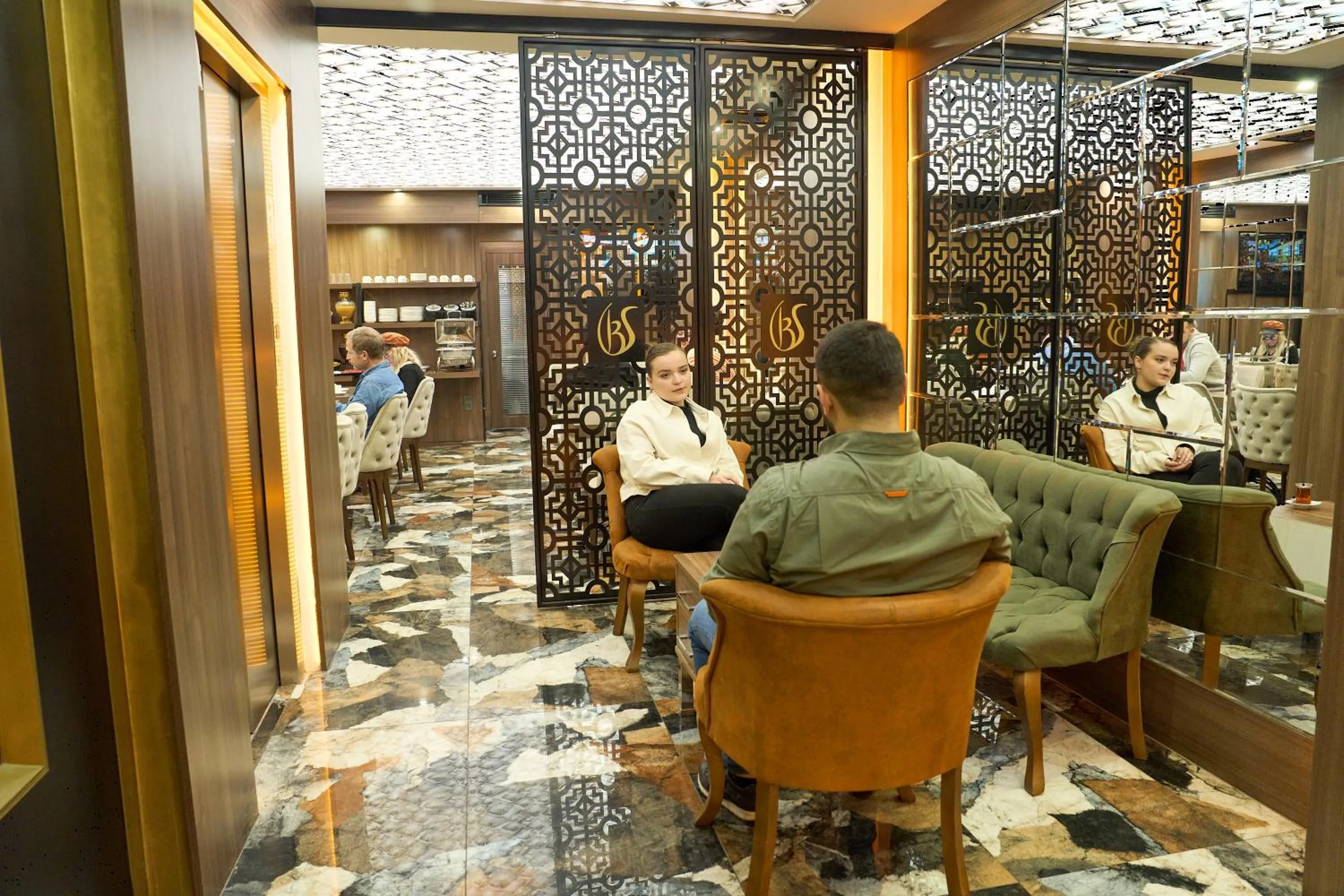 Lobby or reception in Bonne Sante Hotel