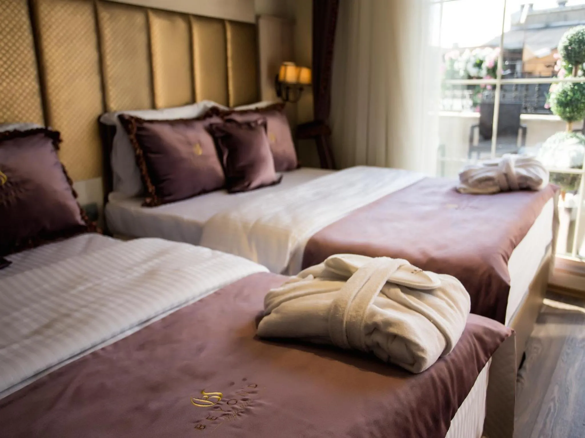 Photo of the whole room, Bed in Bonne Sante Hotel