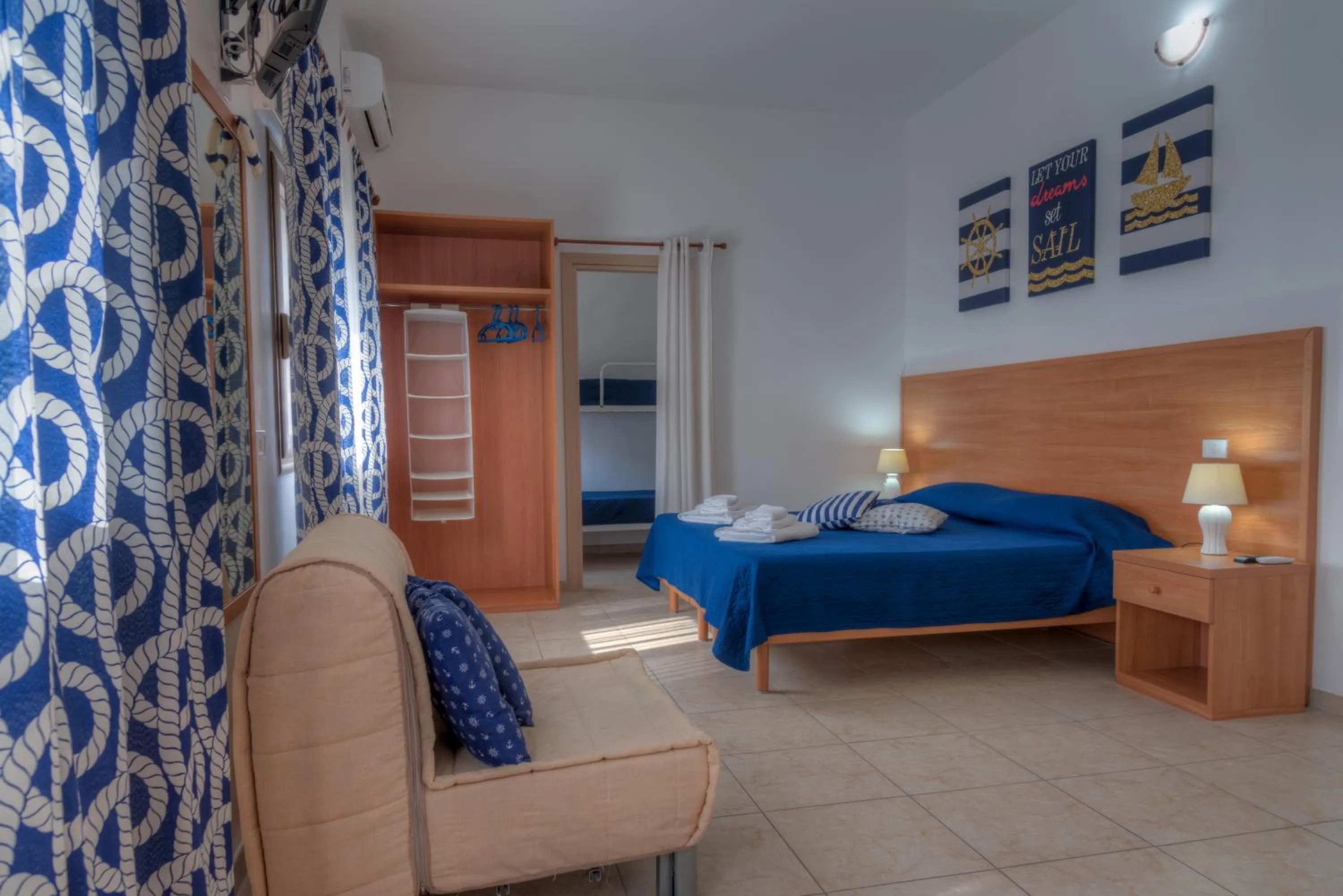 Photo of the whole room, Bed in Aquarium Residence