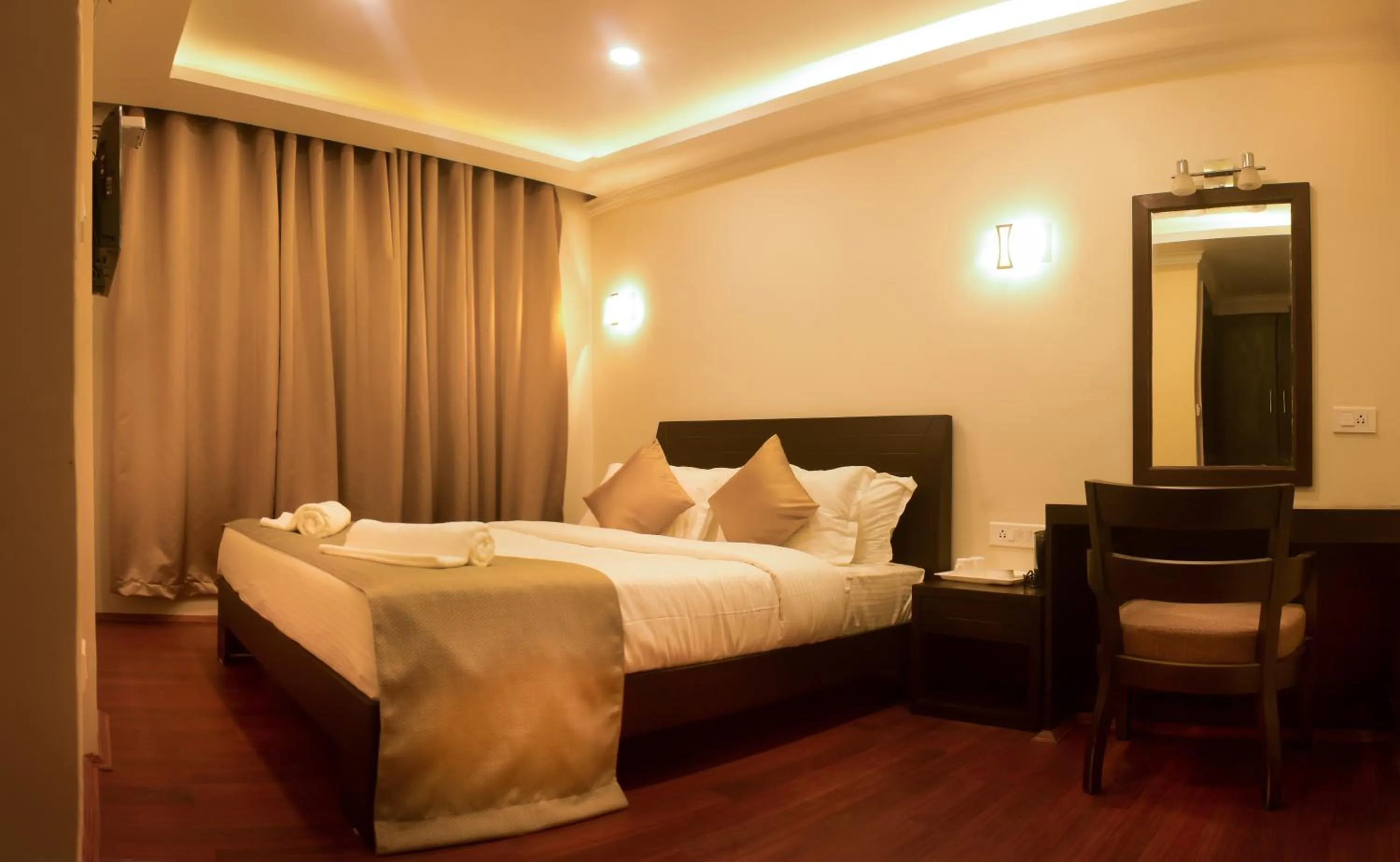 Bed in Hotel Sher-E-Punjab & Spa