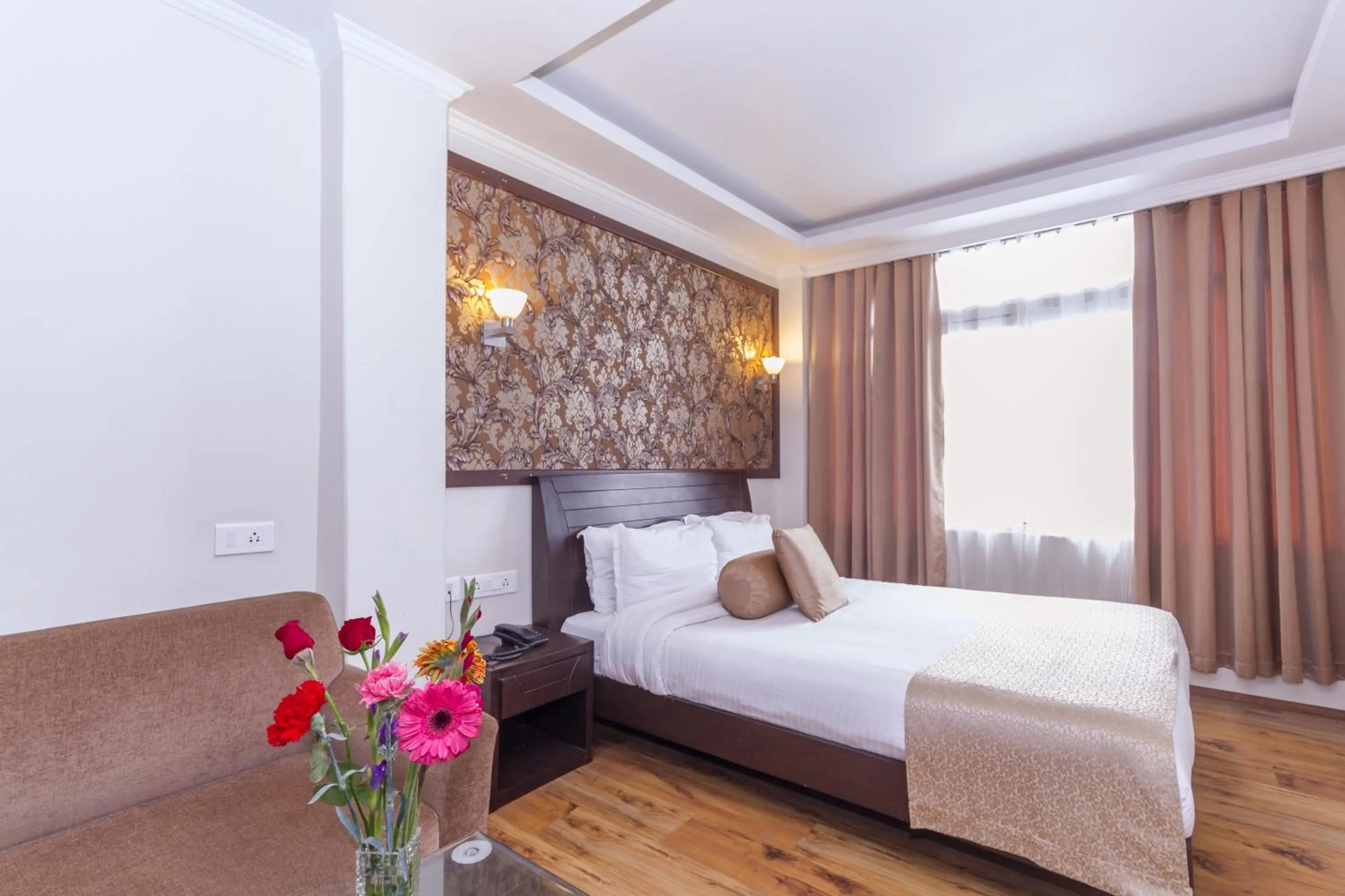 Bed in Hotel Sher-E-Punjab & Spa