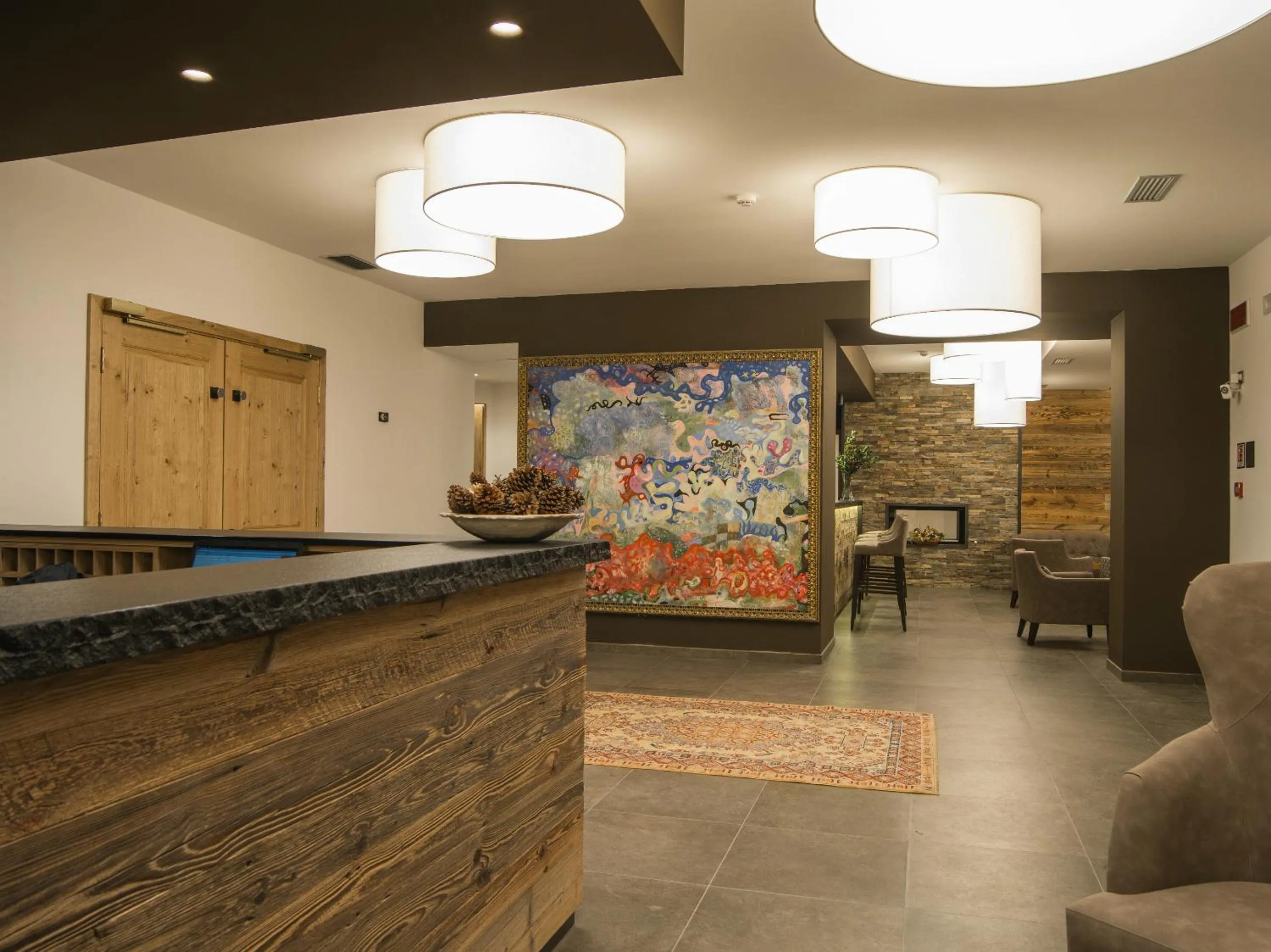 Lobby or reception in Hotel Garnì Caminetto