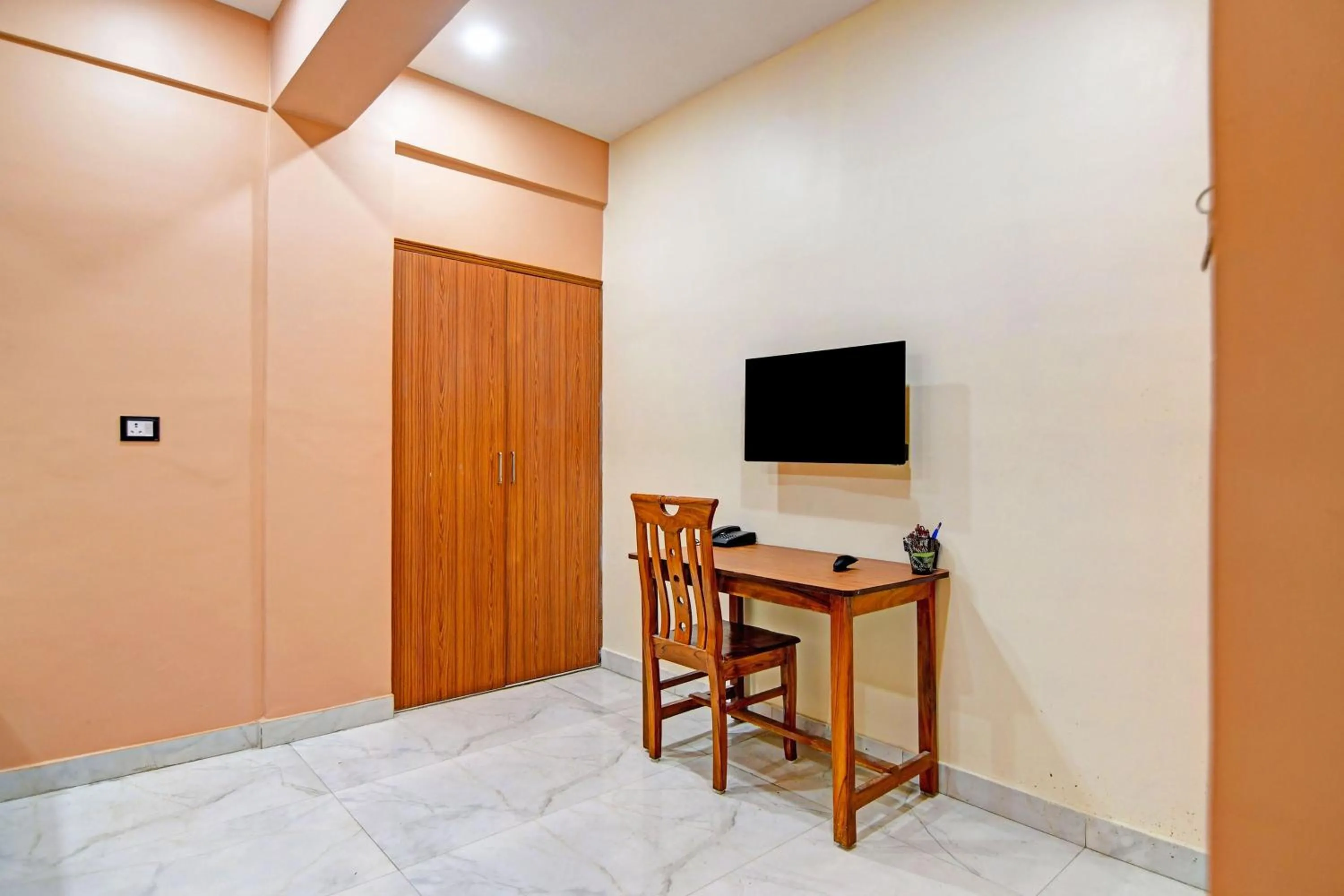 Bedroom in Super Collection O Metropolis Mall Kolkata Formerly Ax Inn