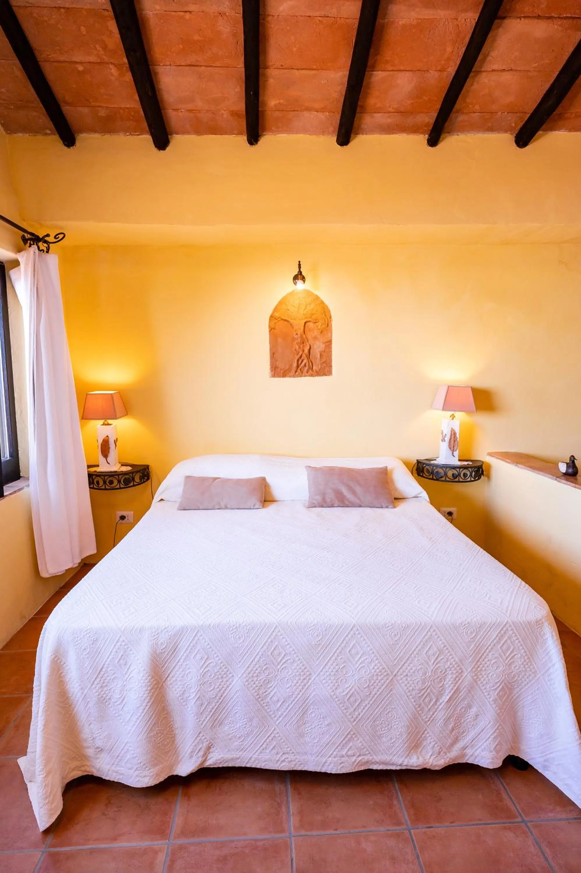 Bed in Marulivo Hotel