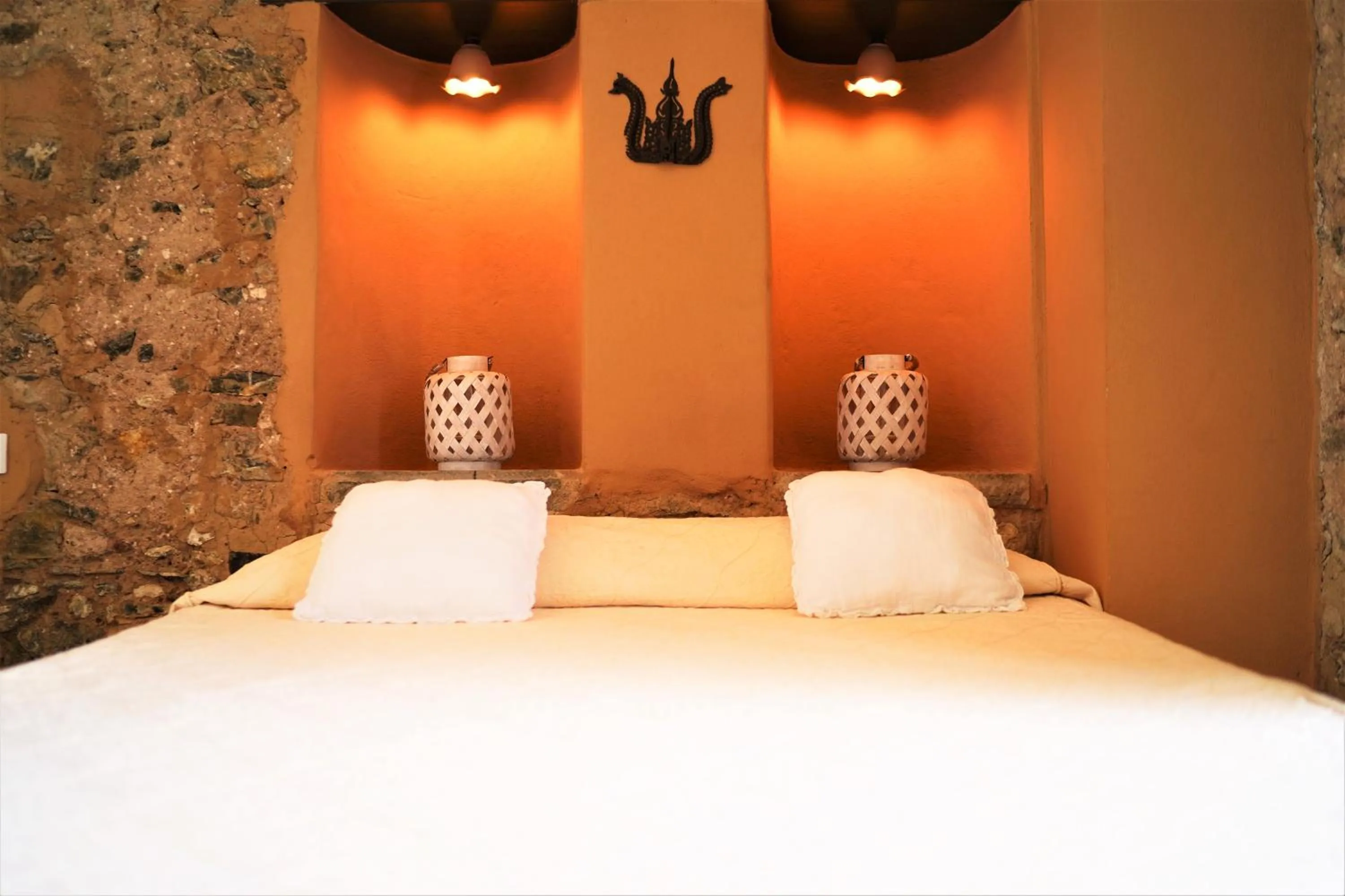 Bed in Marulivo Hotel