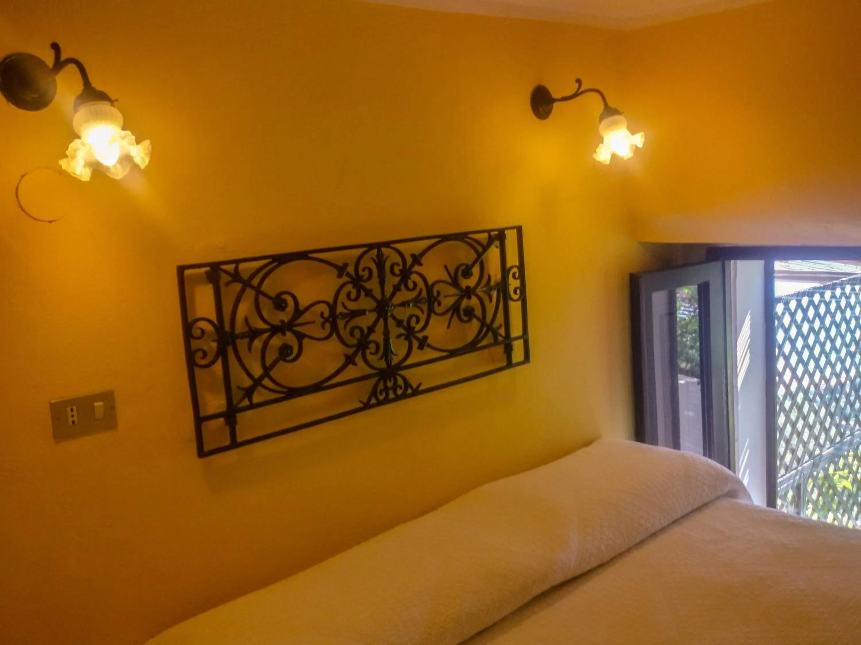 Bed in Marulivo Hotel