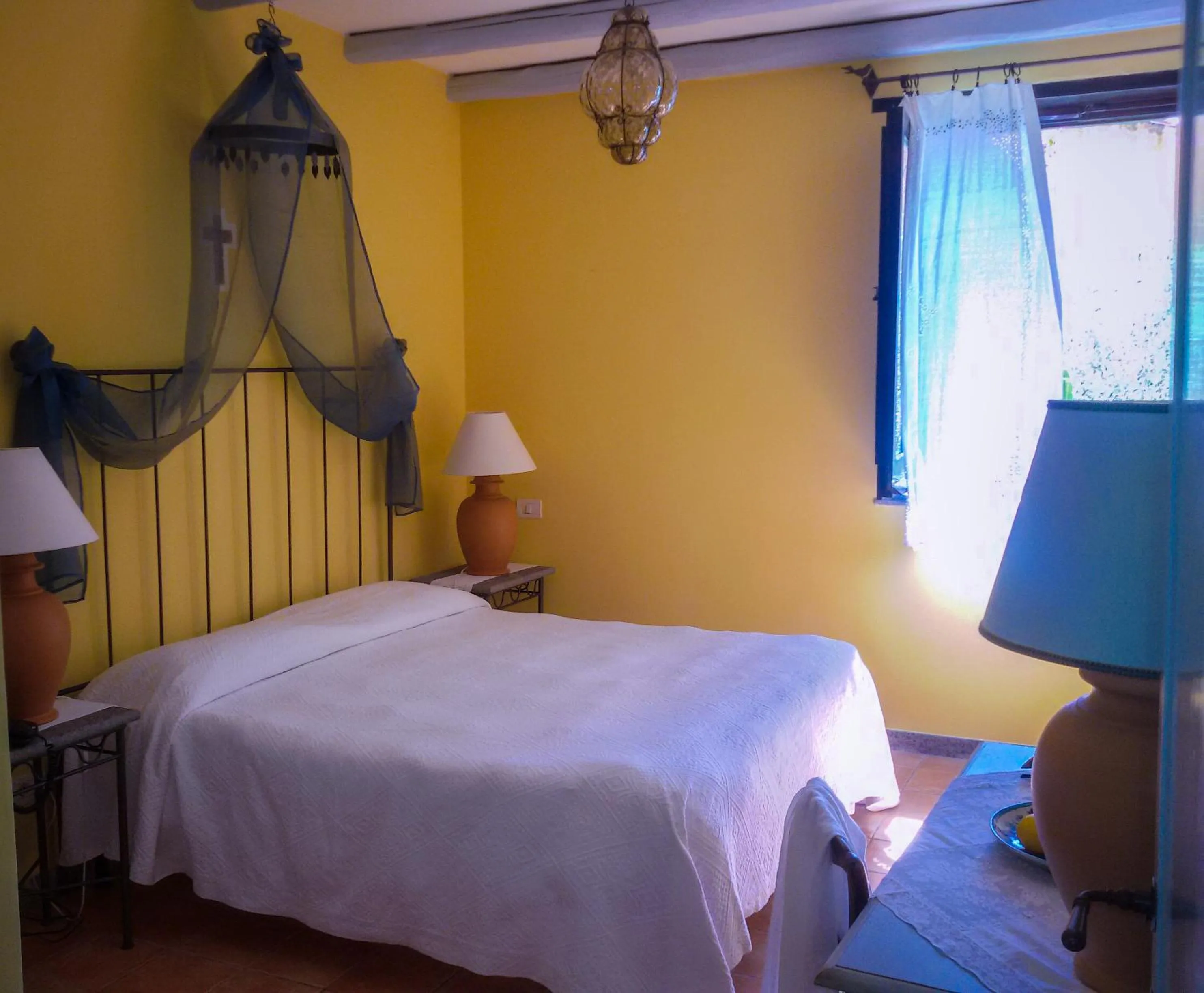 Photo of the whole room, Bed in Marulivo Hotel