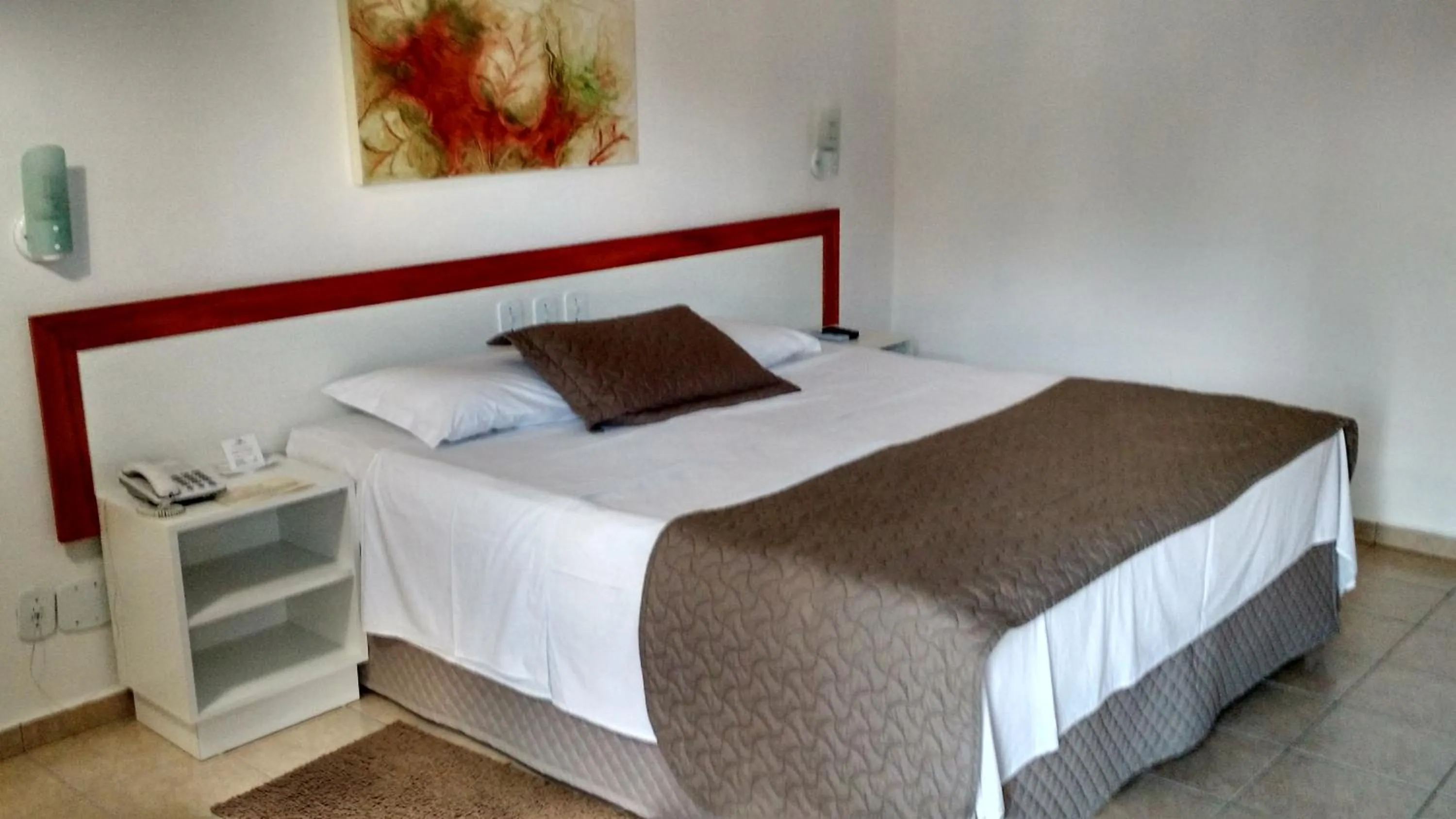 Bed in Hotel Pousada Lord