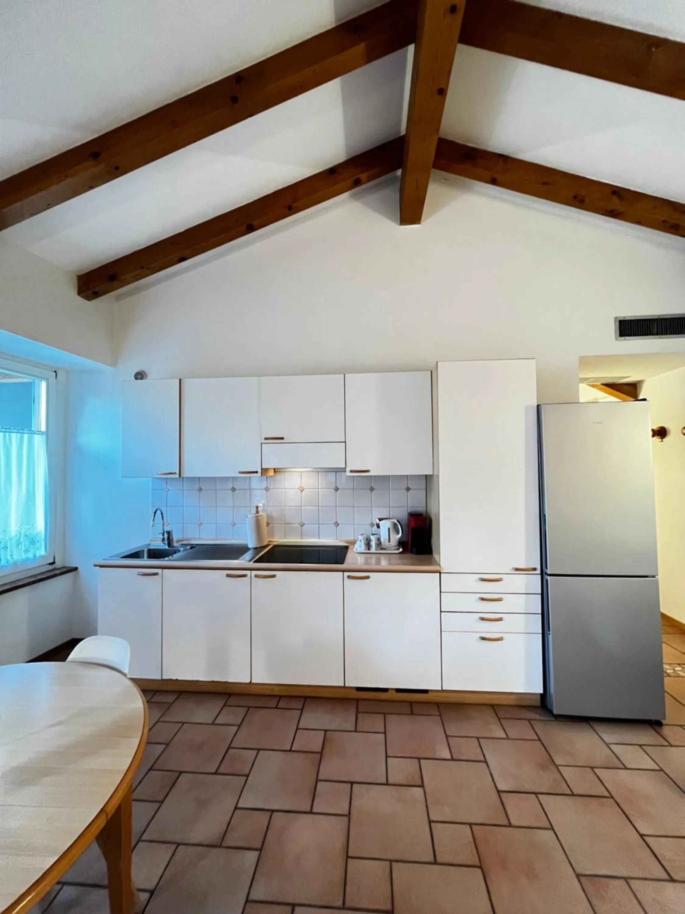 Kitchen or kitchenette in Manci Apartments by Hotel America