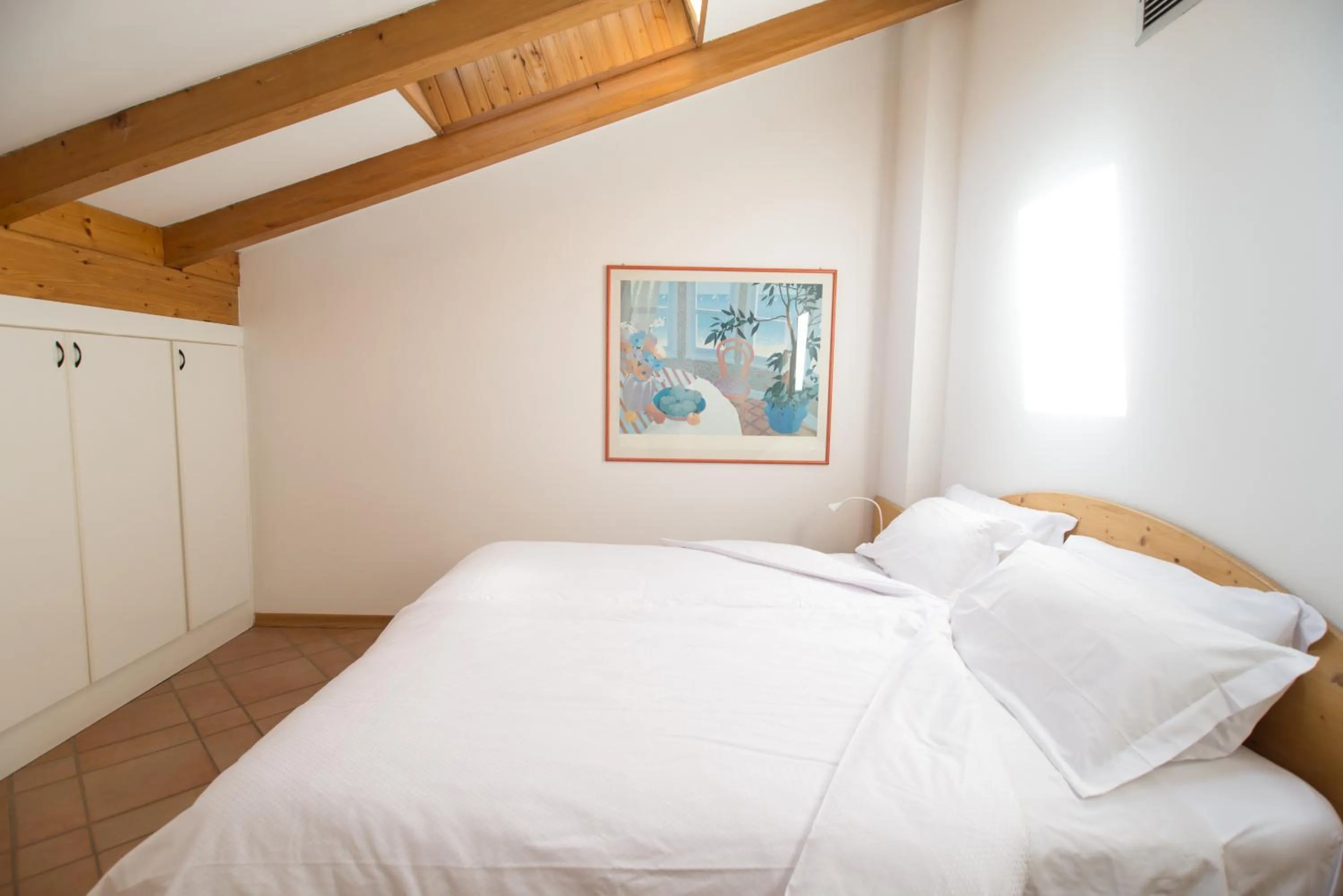 Bed in Manci Apartments by Hotel America
