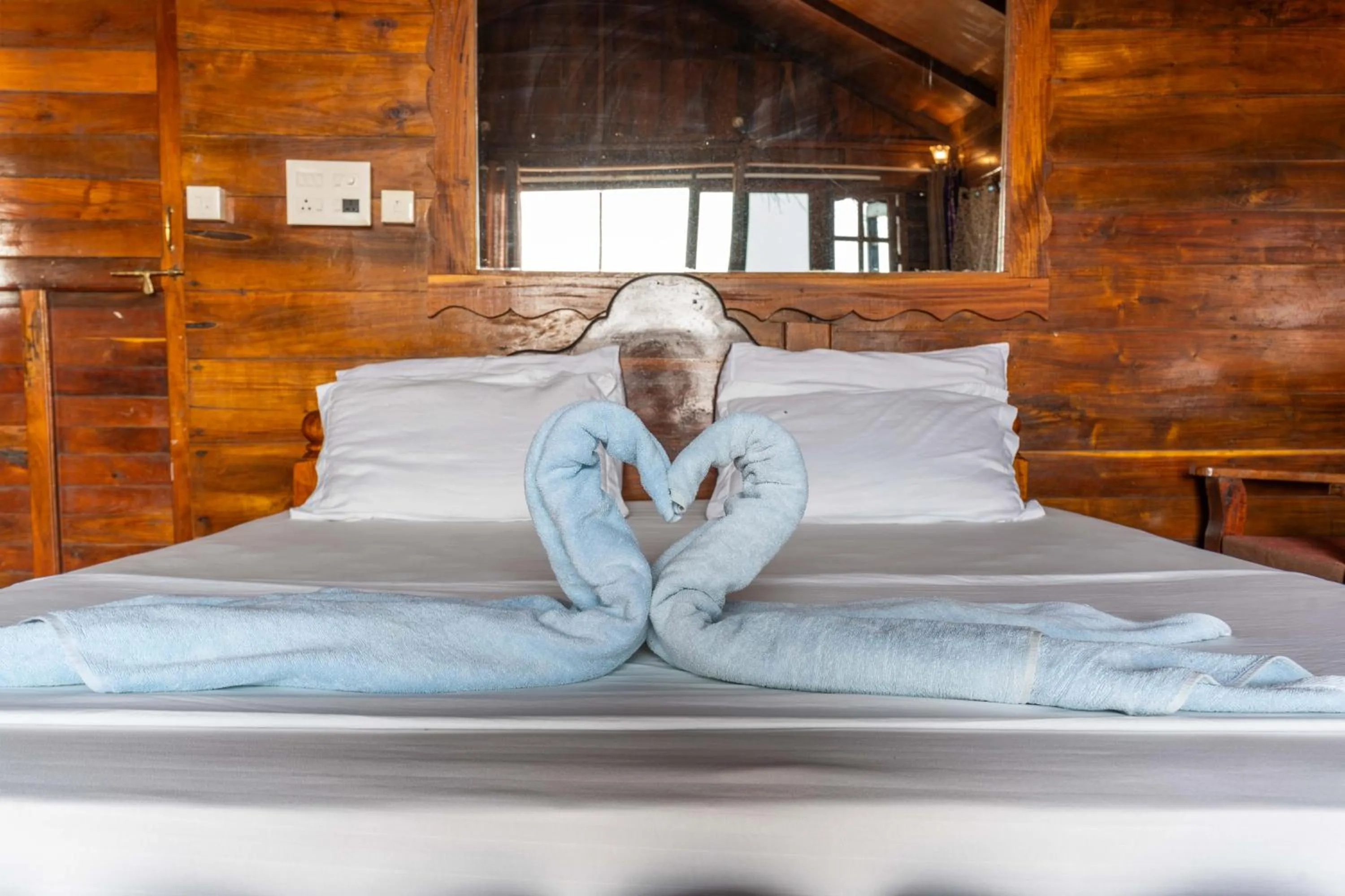 Bed in Blue Lagoon Resort Goa