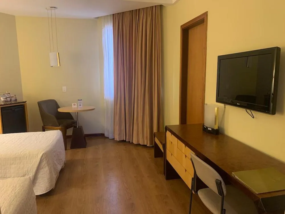 Bed in Golden Tower Pinheiros by Fênix Hotéis