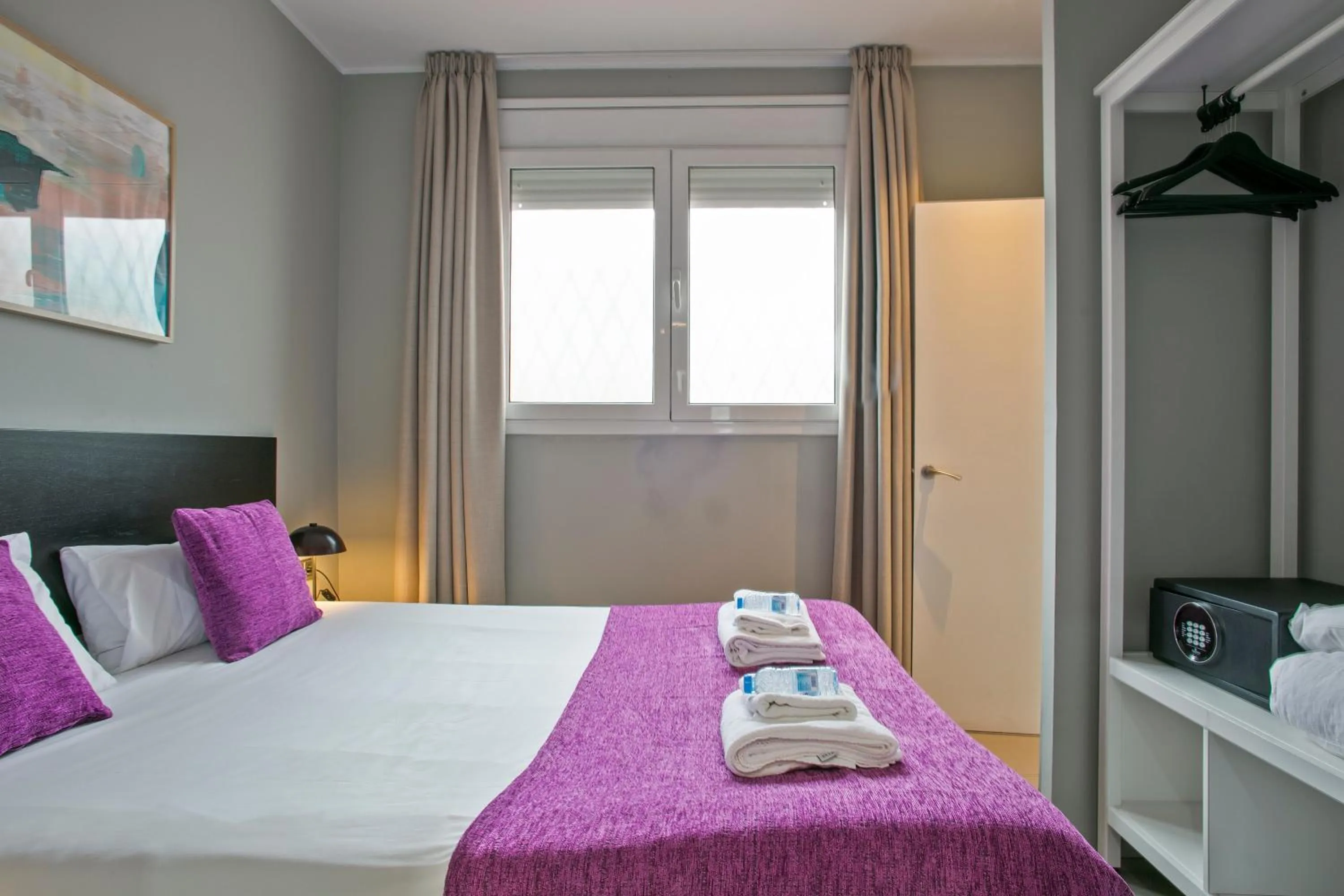 Bedroom, Bed in Numa I Caja Apartments