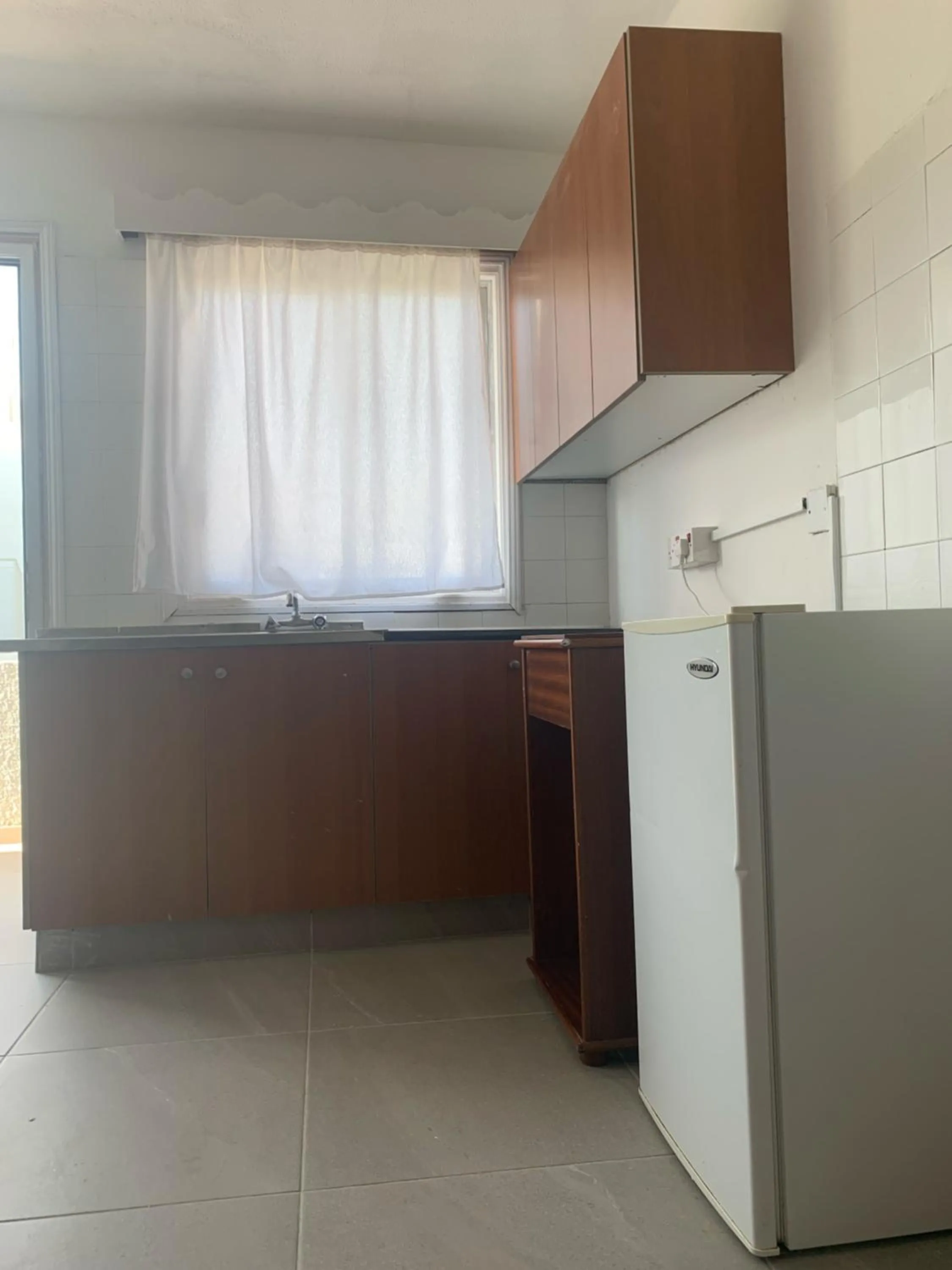 Kitchen or kitchenette in Flora Maria Hotel