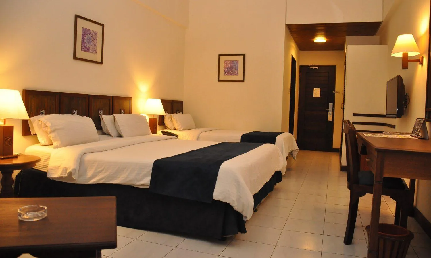 Bed in Royal Court Hotel