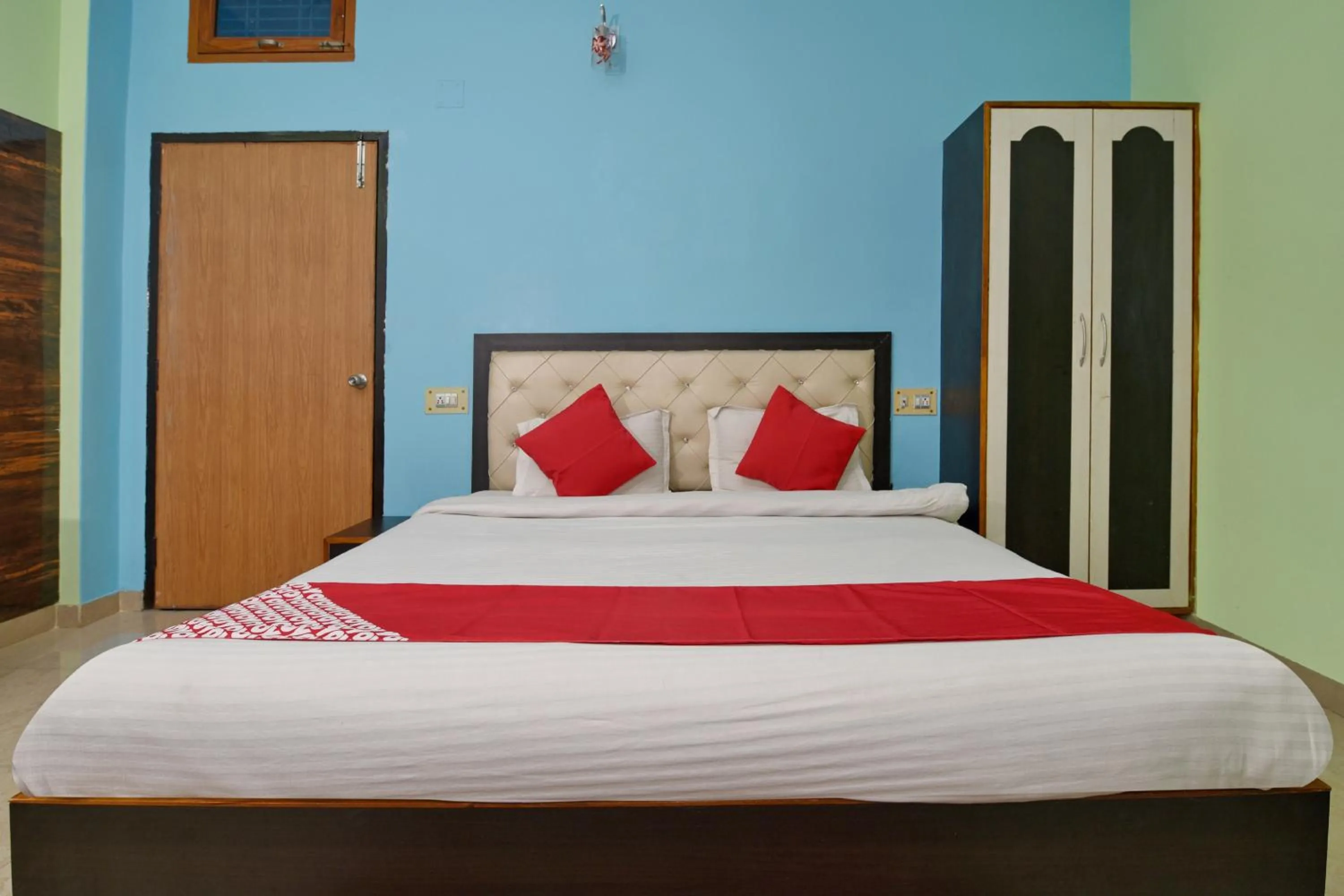 Bedroom, Bed in Hotel O Chaitanya Inn