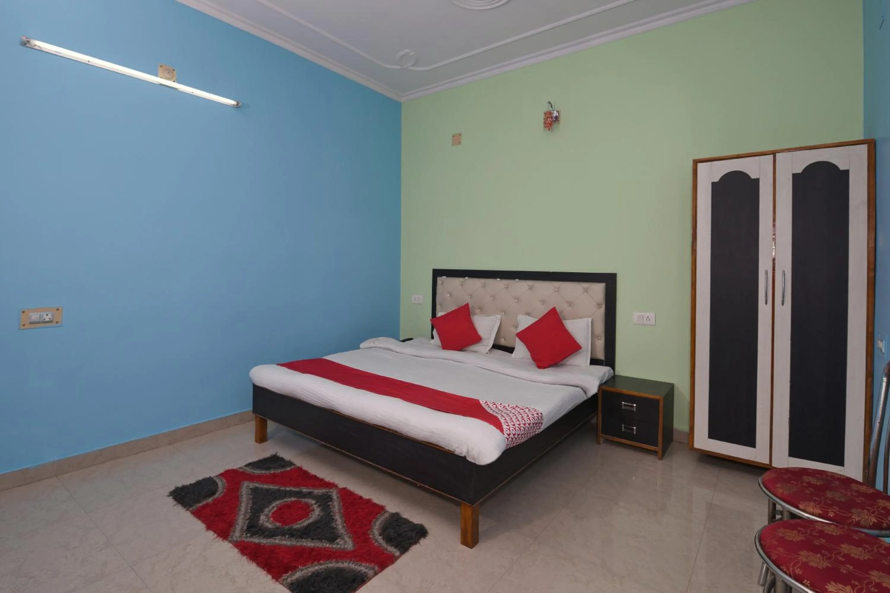 Bedroom, Bed in Hotel O Chaitanya Inn