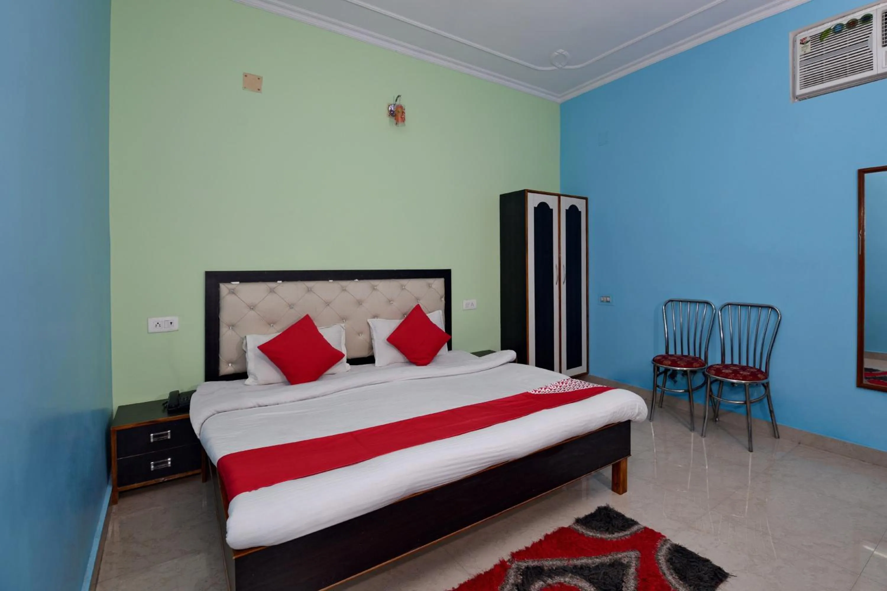 Bedroom, Bed in Hotel O Chaitanya Inn