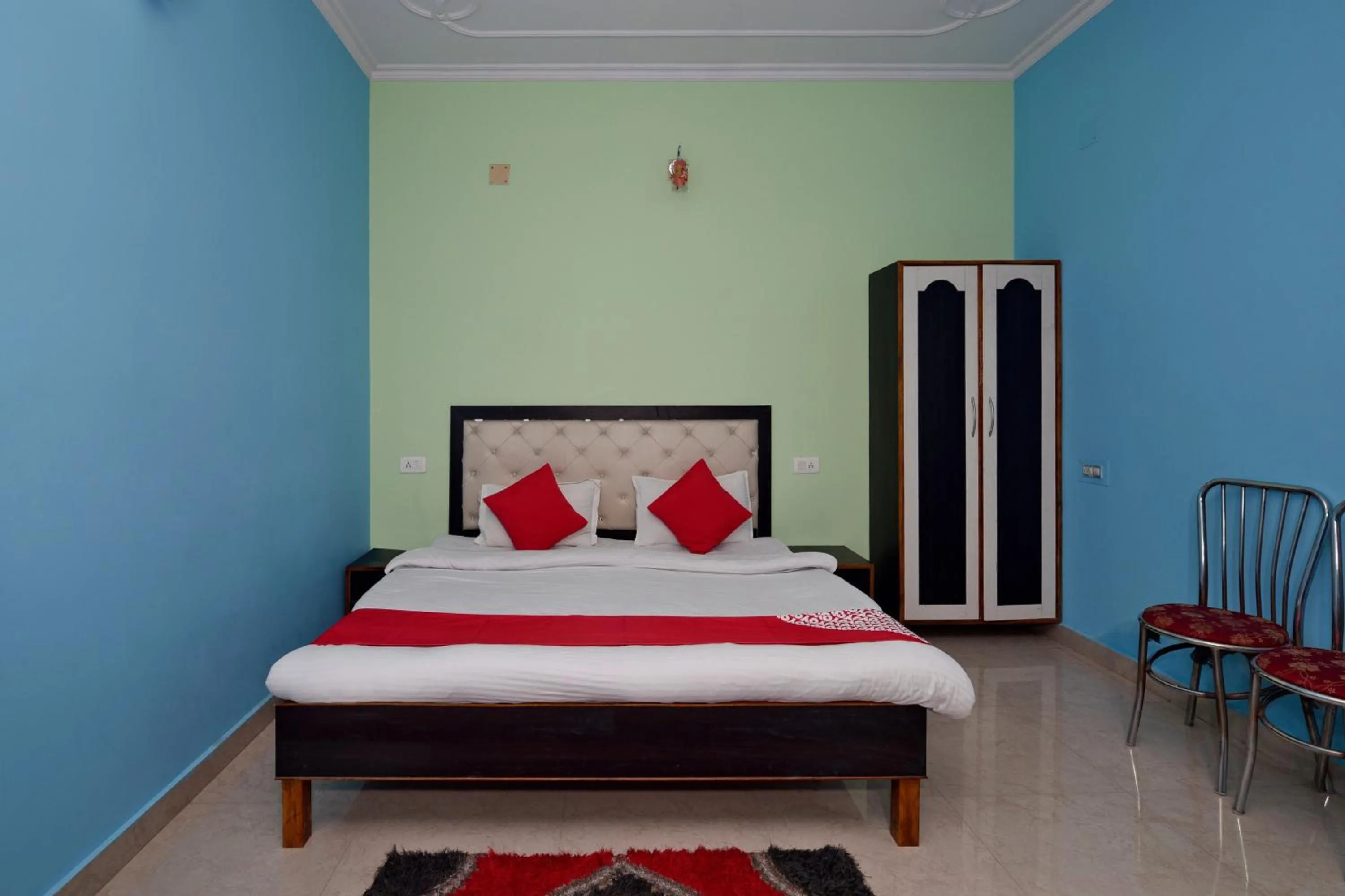 Bedroom, Bed in Hotel O Chaitanya Inn