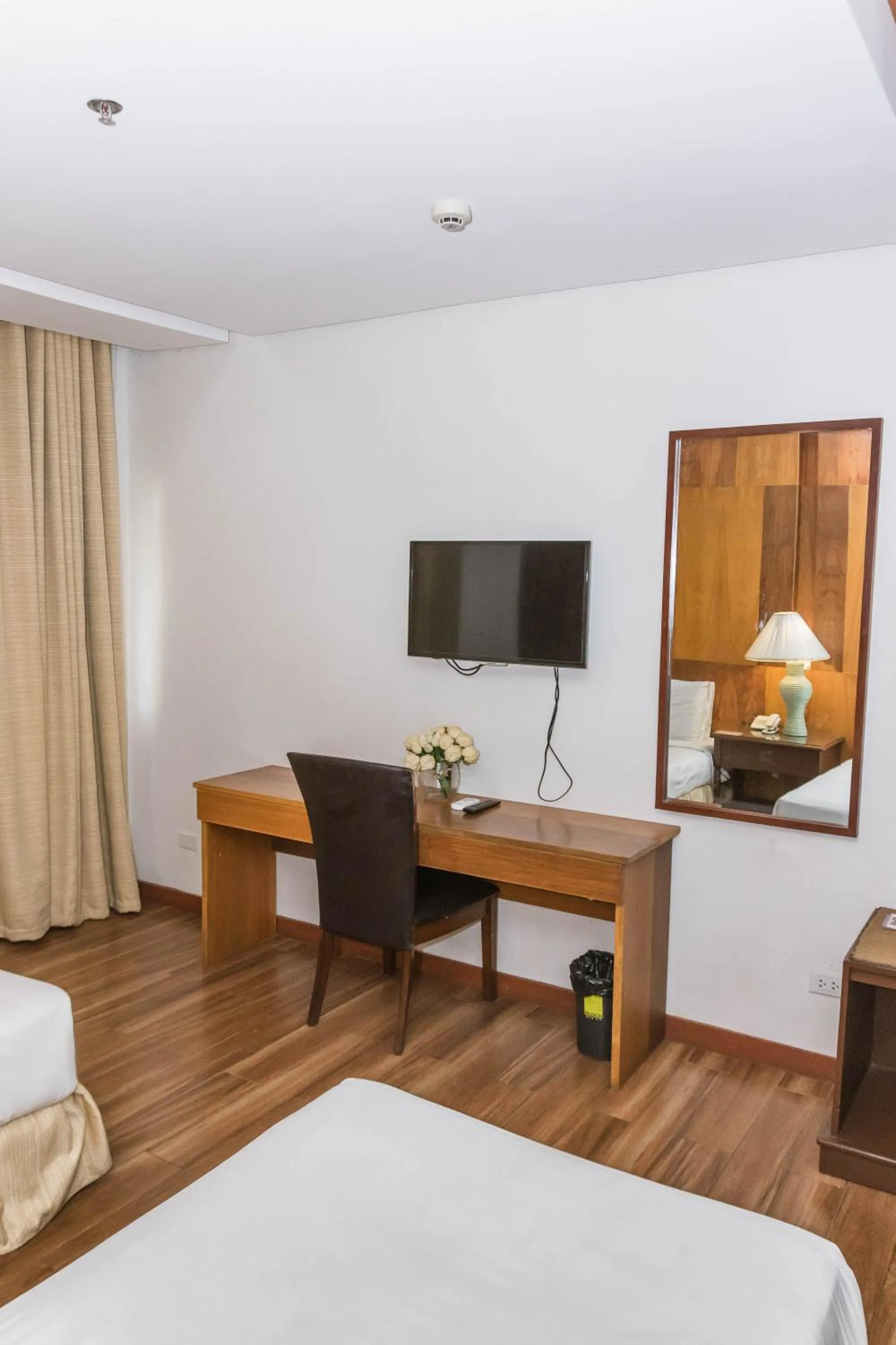 Bed in La Fiesta Hotel