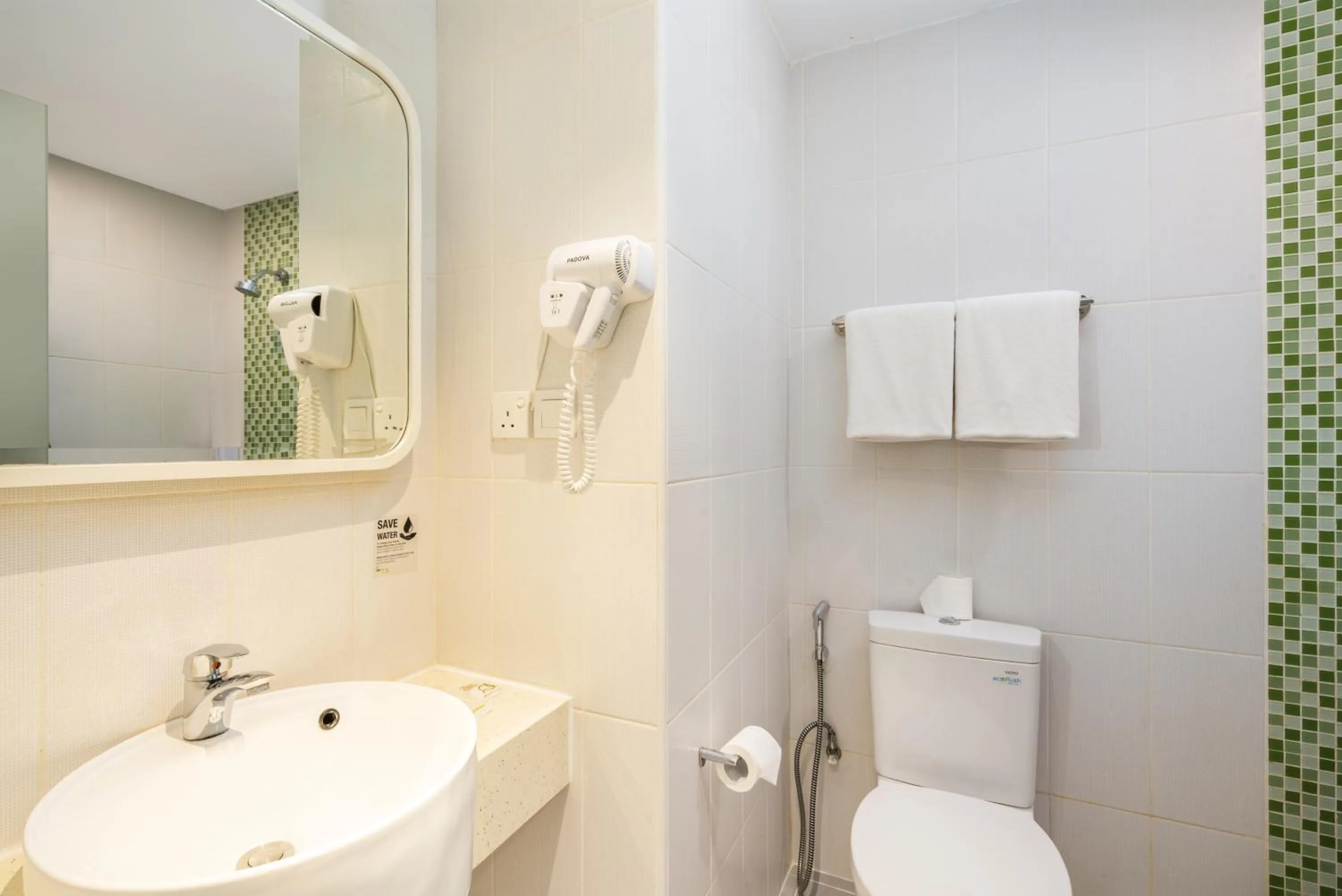 Bathroom in Zest Harbour Bay Batam by Swiss-Belhotel International