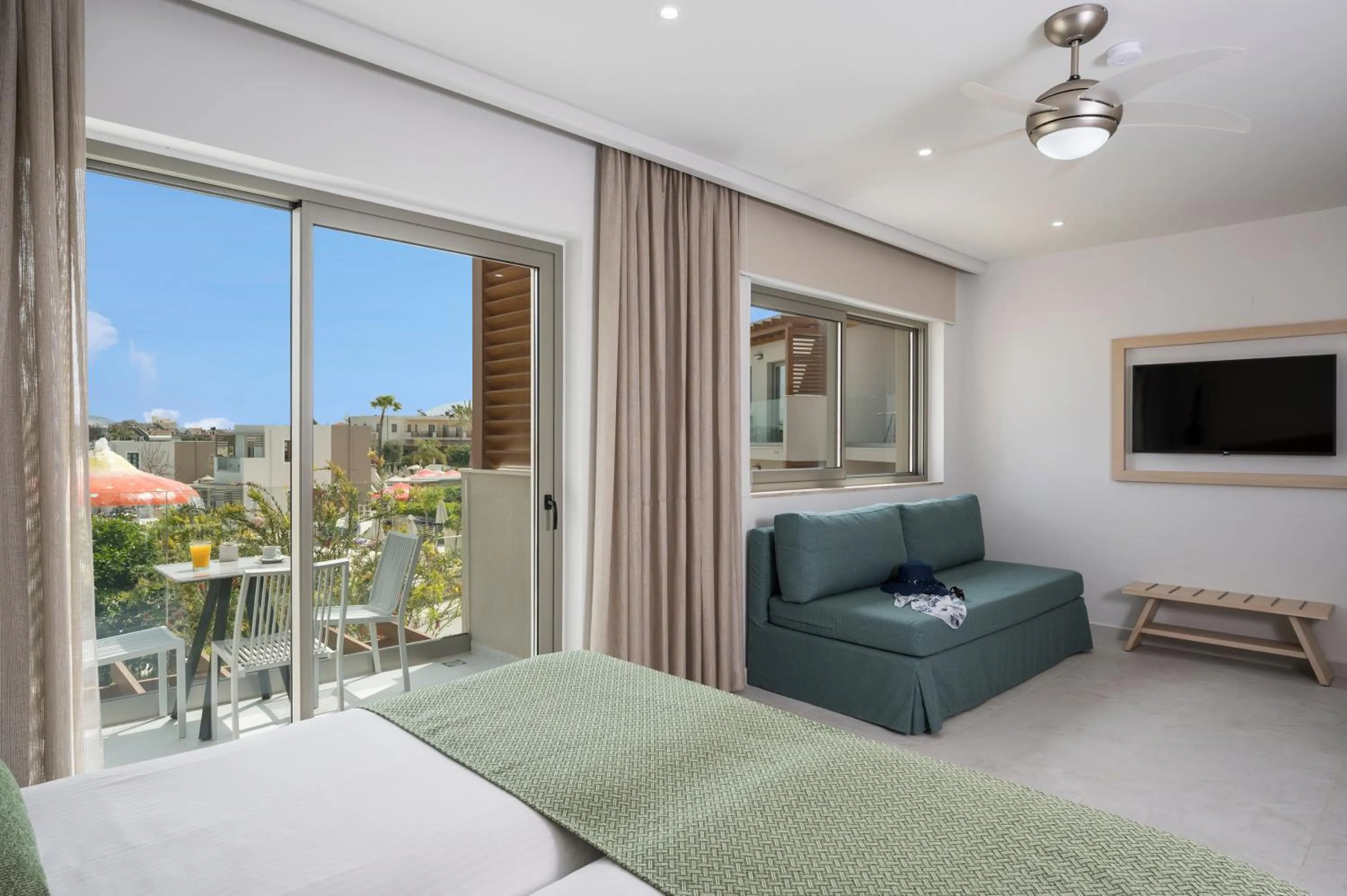 Balcony/Terrace, Bed in Sirios Village Hotel & Bungalows - All Inclusive