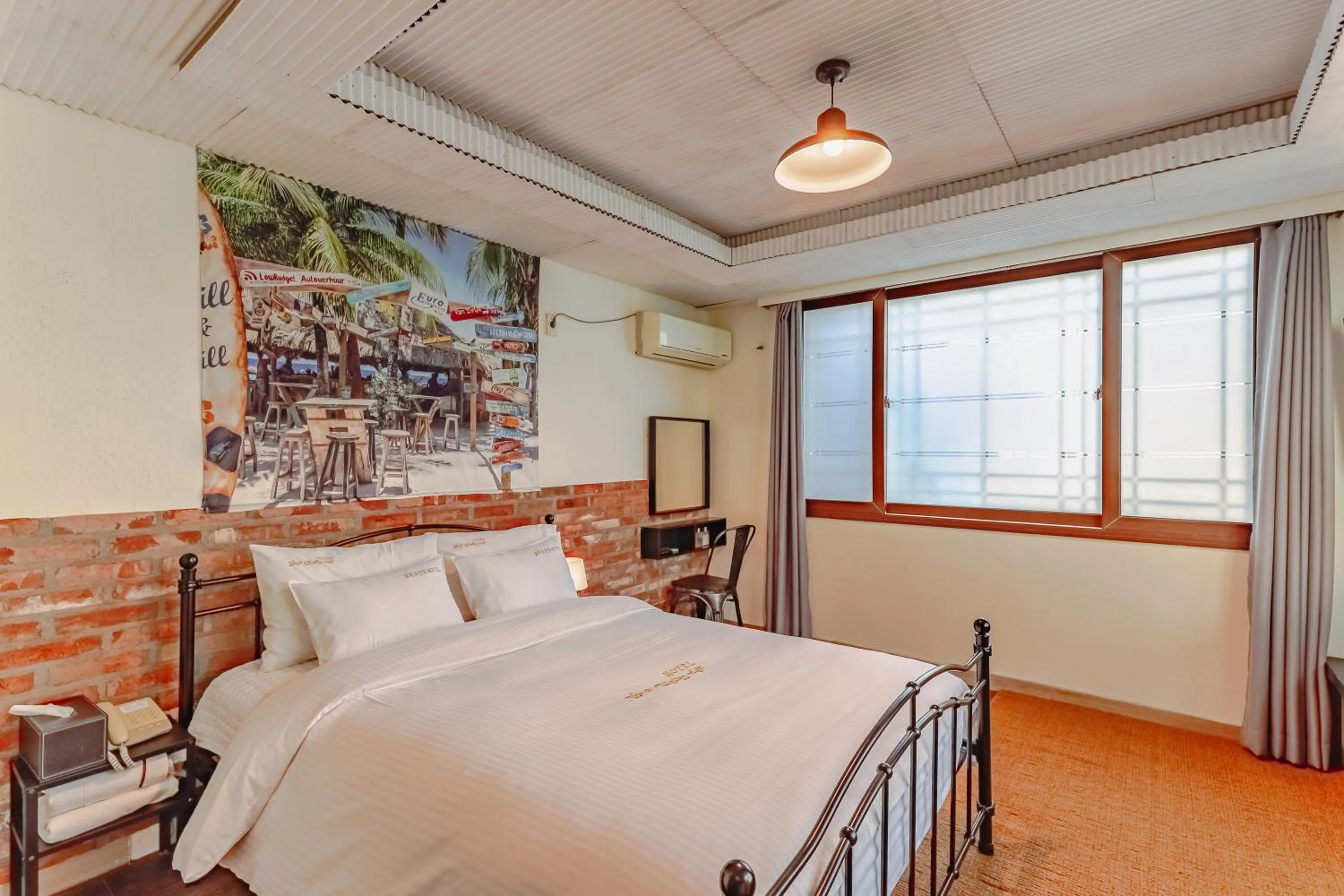 Bed in Residence Hotel Blue Ocean View