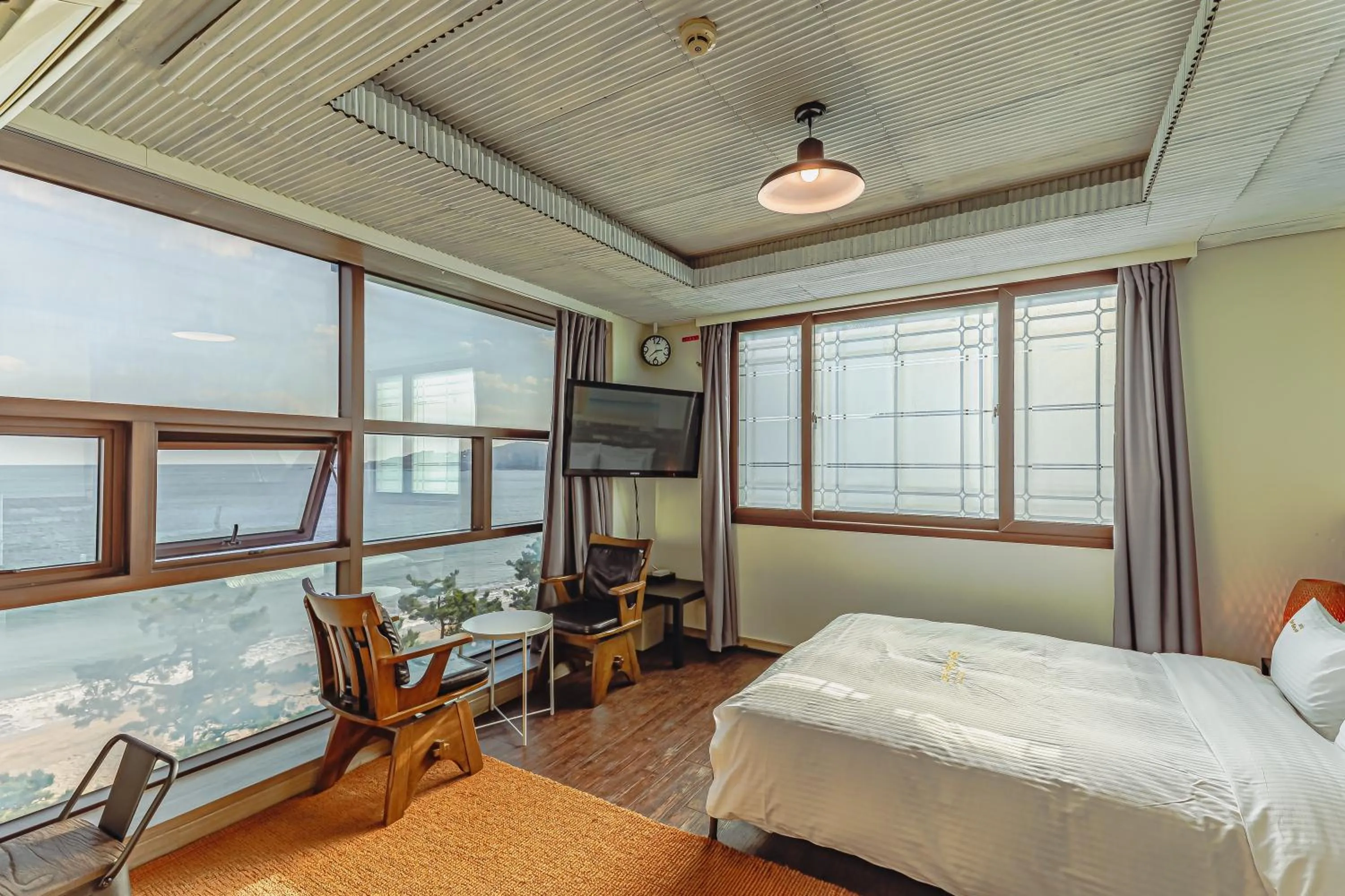 Bed in Residence Hotel Blue Ocean View