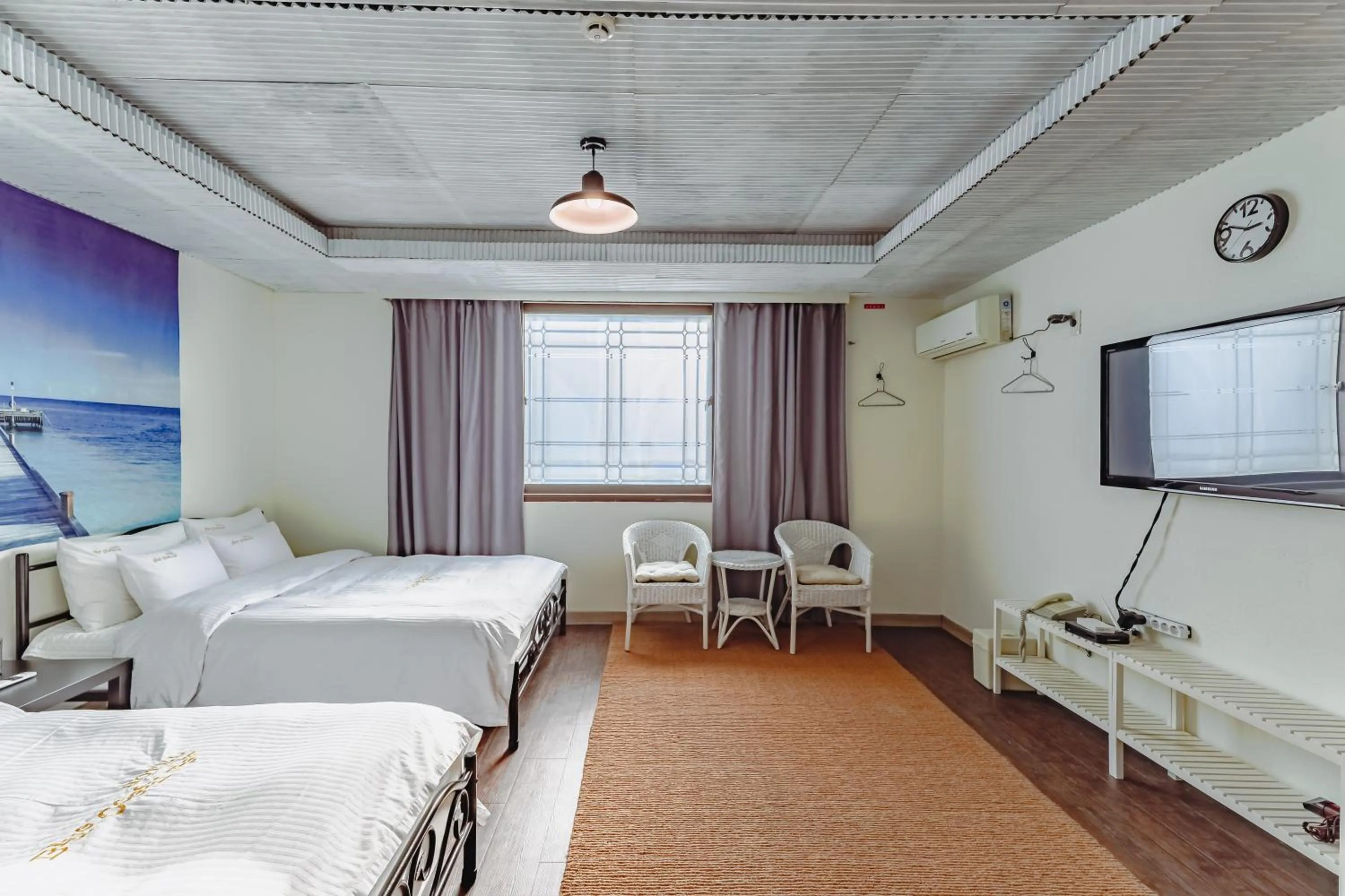 Bed in Residence Hotel Blue Ocean View