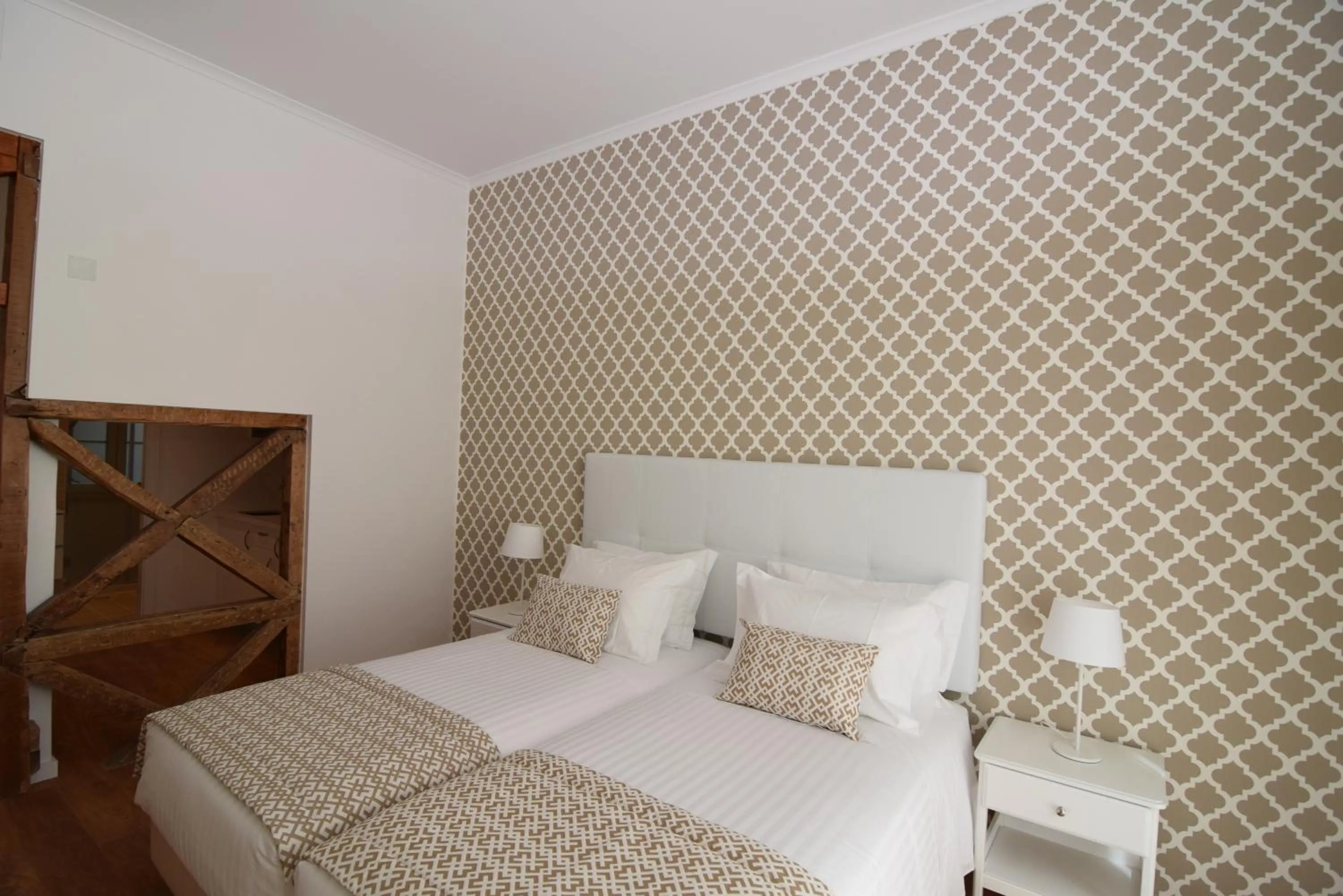 Decorative detail, Bed in Dream Chiado Apartments